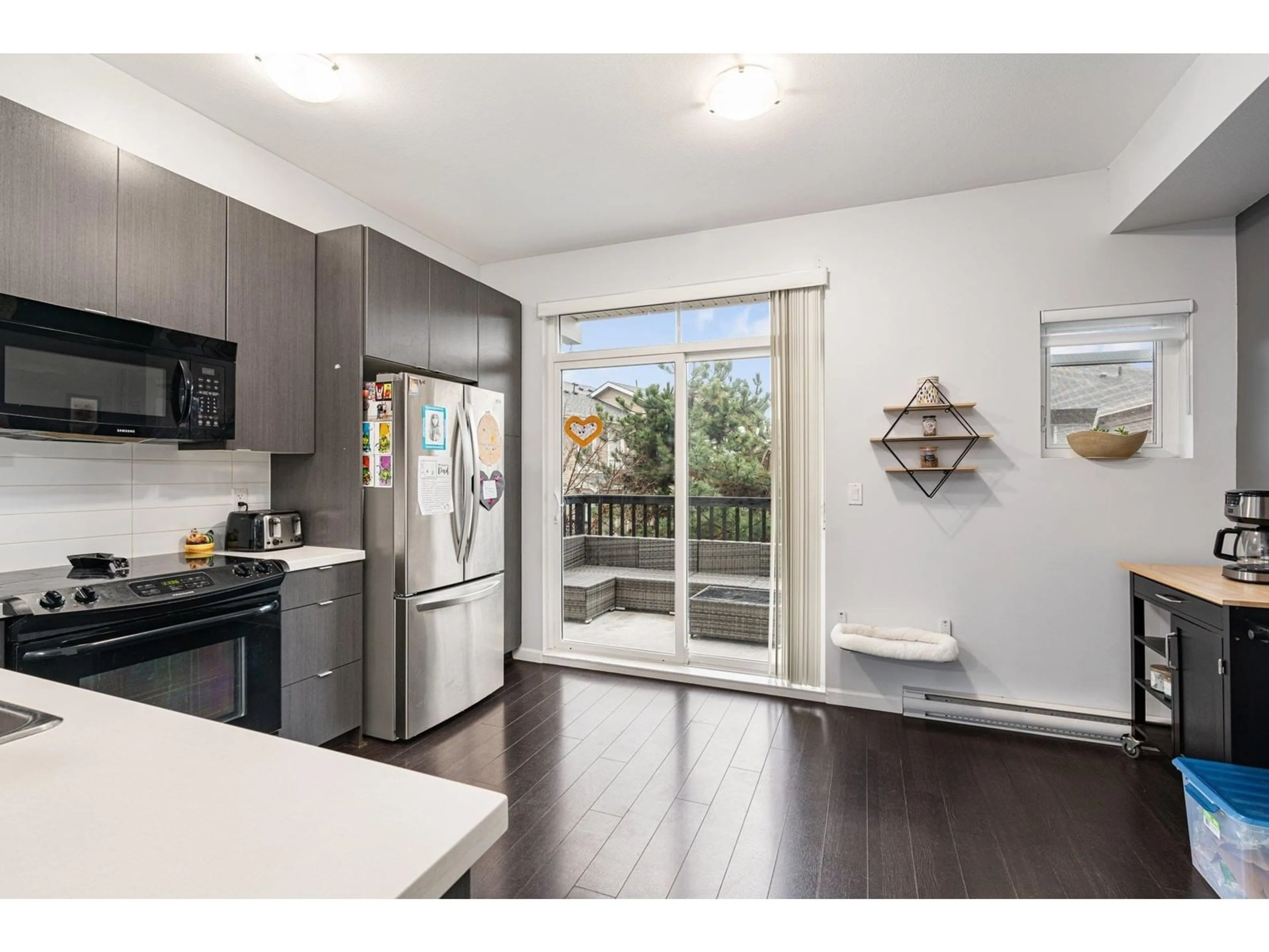 Open concept kitchen, wood/laminate floor for 88 - 19505 68A, Surrey British Columbia V4N6K3