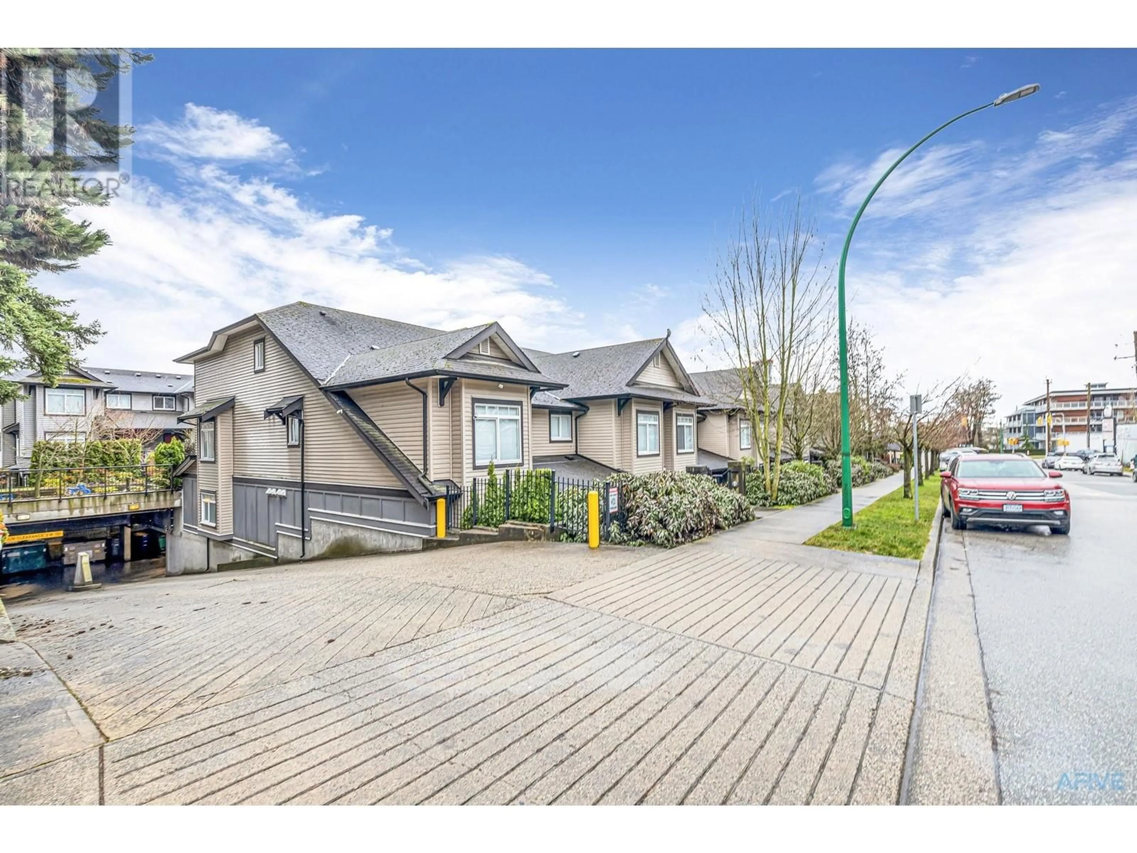 A pic from outside/outdoor area/front of a property/back of a property/a pic from drone, street for 11 - 7428 14TH AVENUE, Burnaby British Columbia V3N0C2