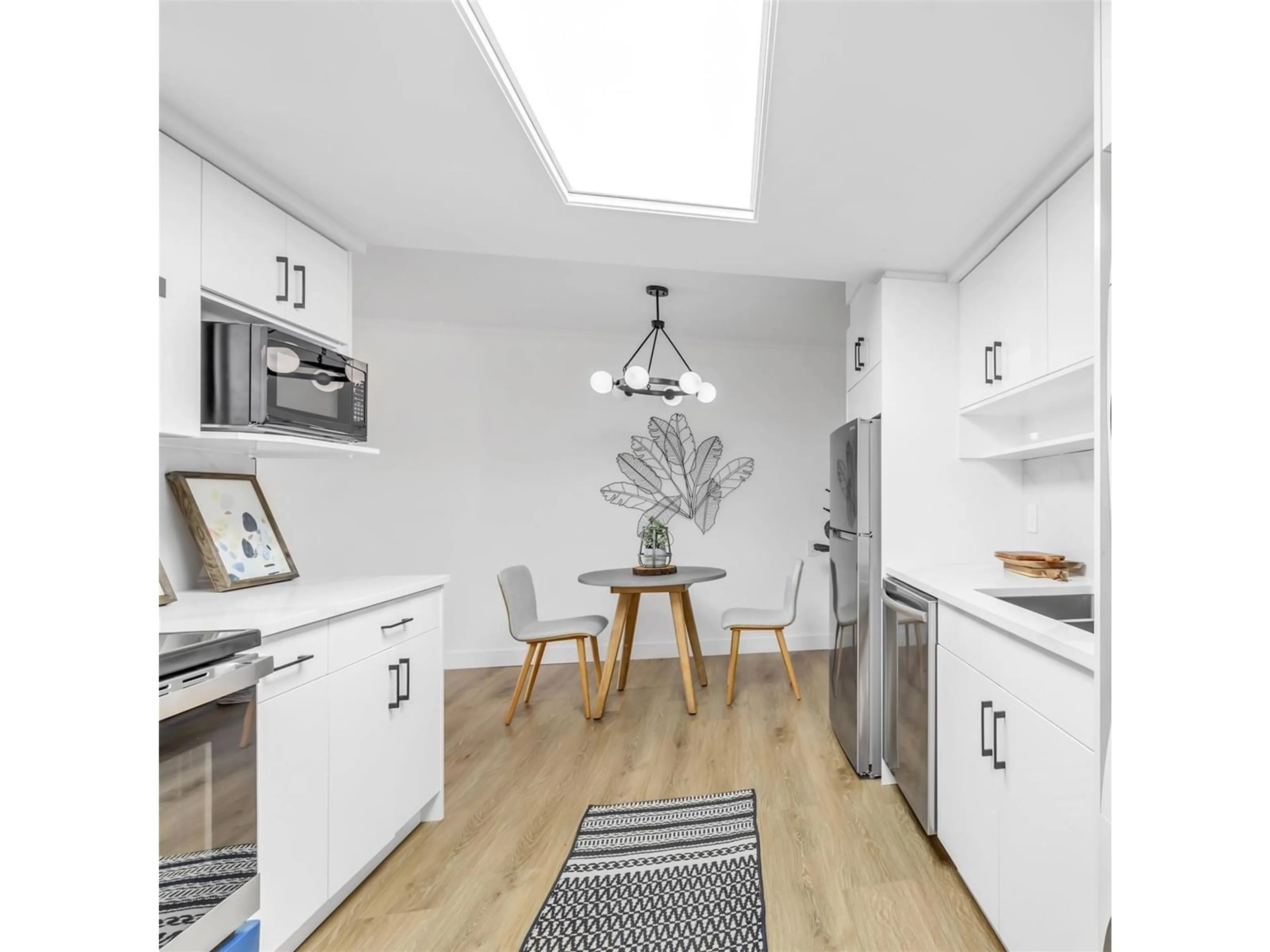 Open concept kitchen, unknown for 208 - 20420 54, Langley British Columbia V3A6N6