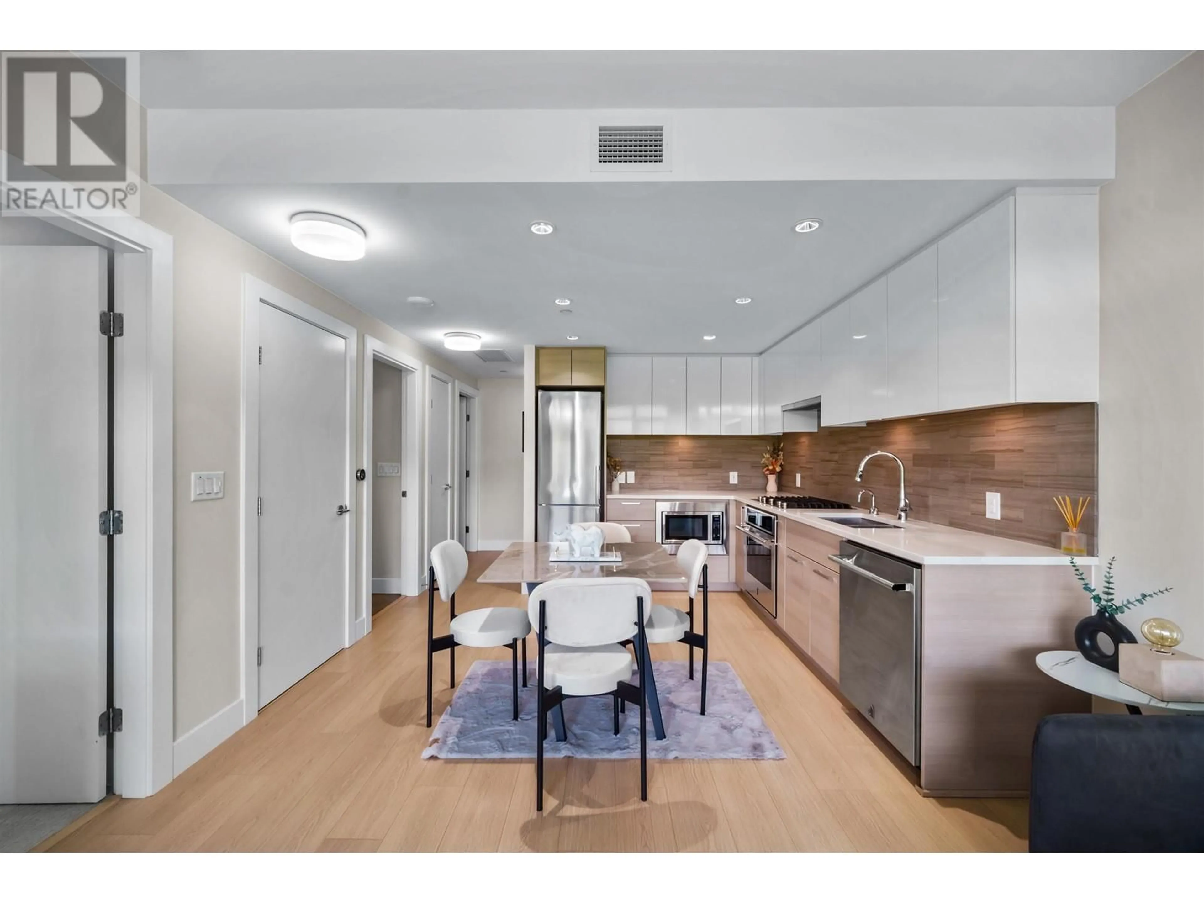 Open concept kitchen, ceramic/tile floor for 1508 - 8533 RIVER DISTRICT CROSSING, Vancouver British Columbia V5S0H2