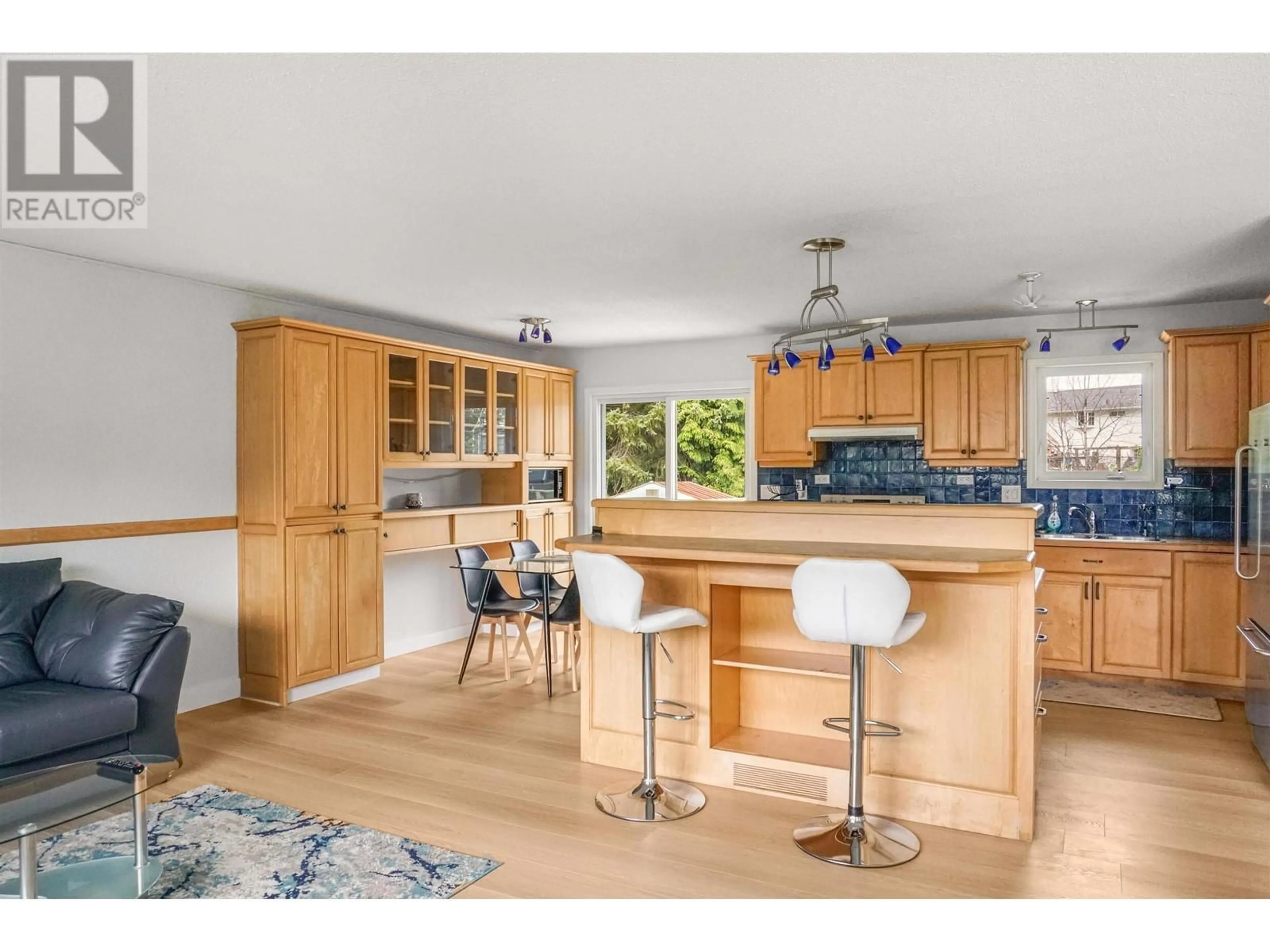 Open concept kitchen, wood/laminate floor for 40 GWYN STREET, Kitimat British Columbia V8C1C9
