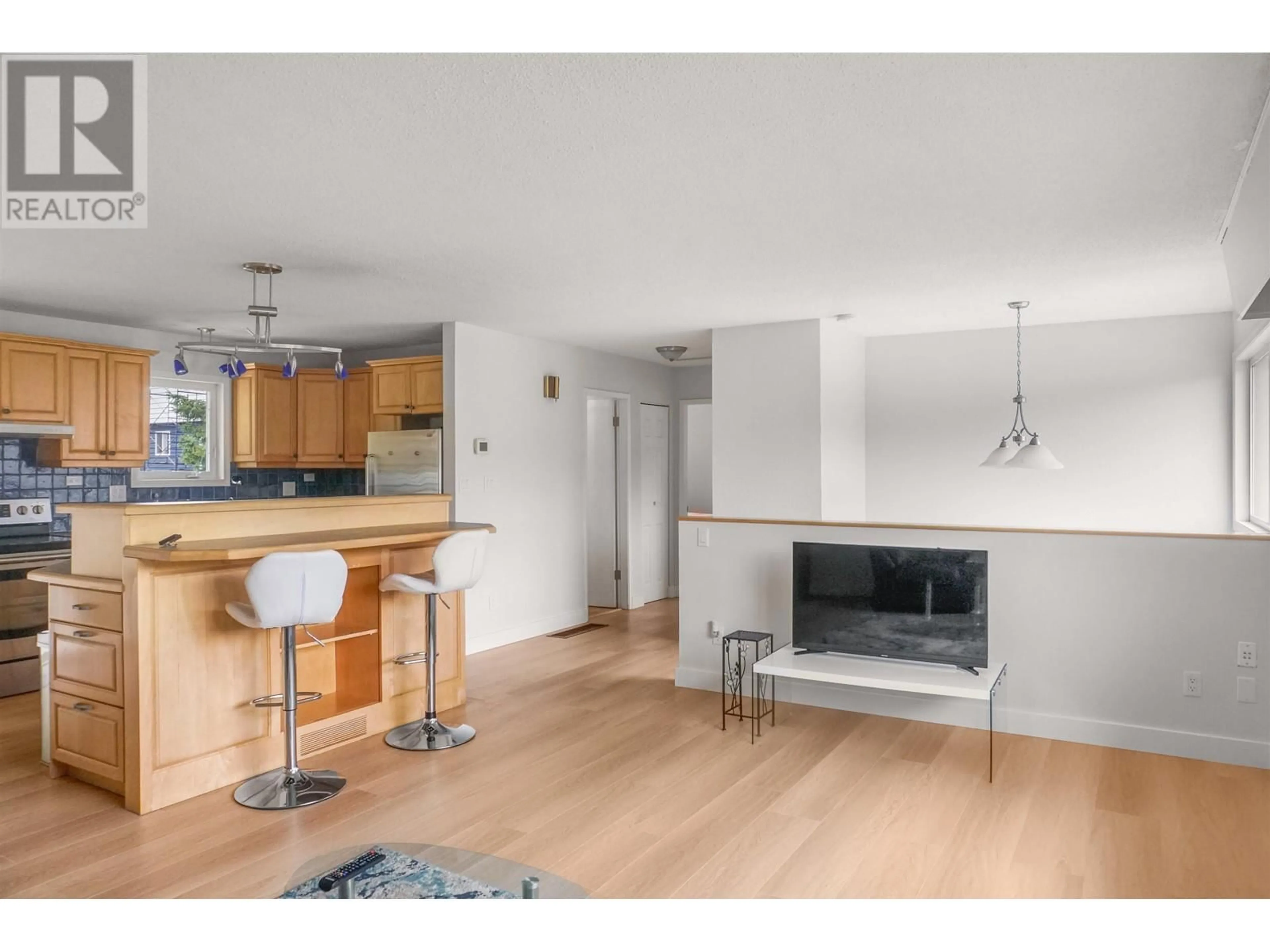 Open concept kitchen, wood/laminate floor for 40 GWYN STREET, Kitimat British Columbia V8C1C9