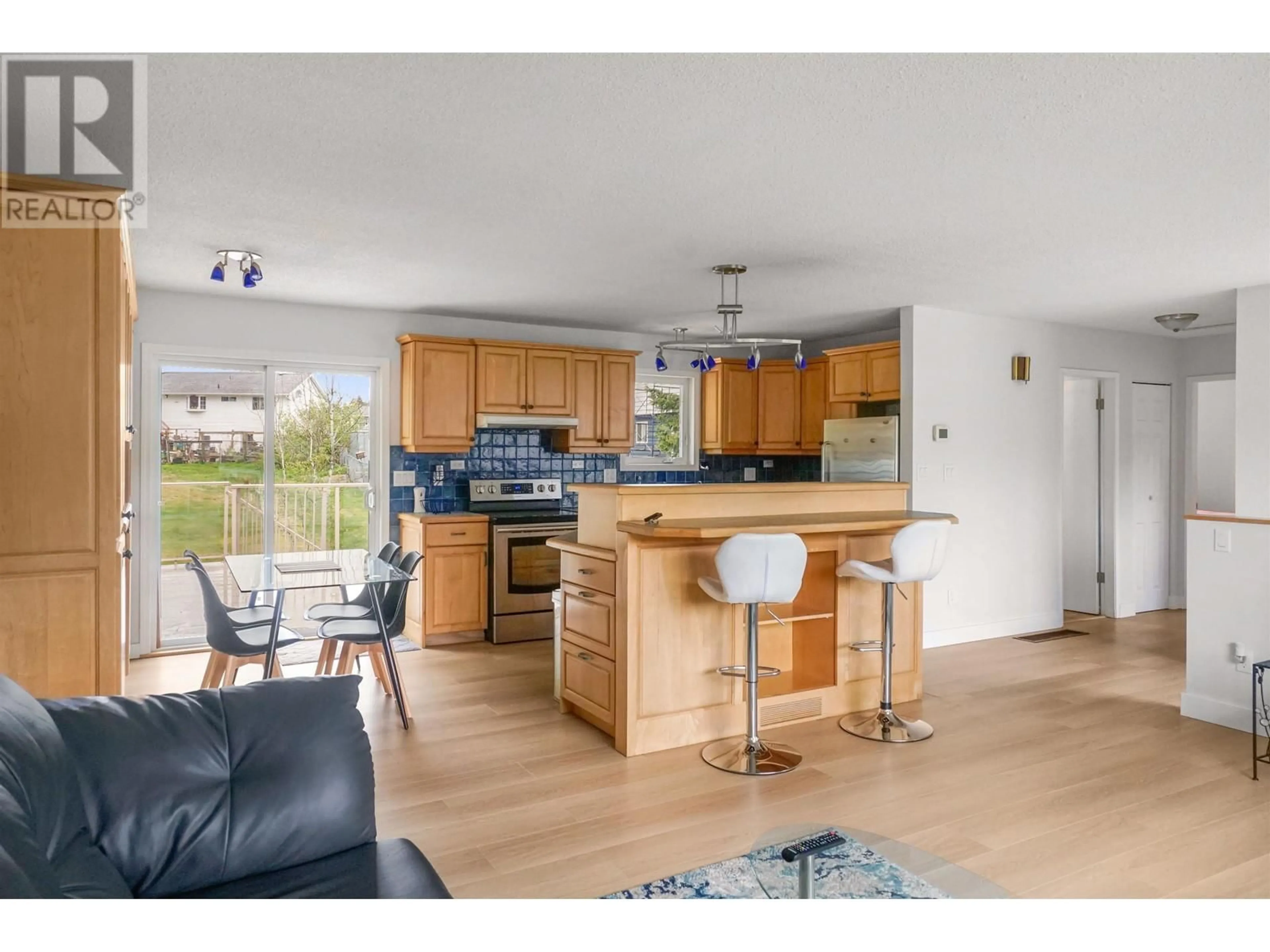Open concept kitchen, wood/laminate floor for 40 GWYN STREET, Kitimat British Columbia V8C1C9