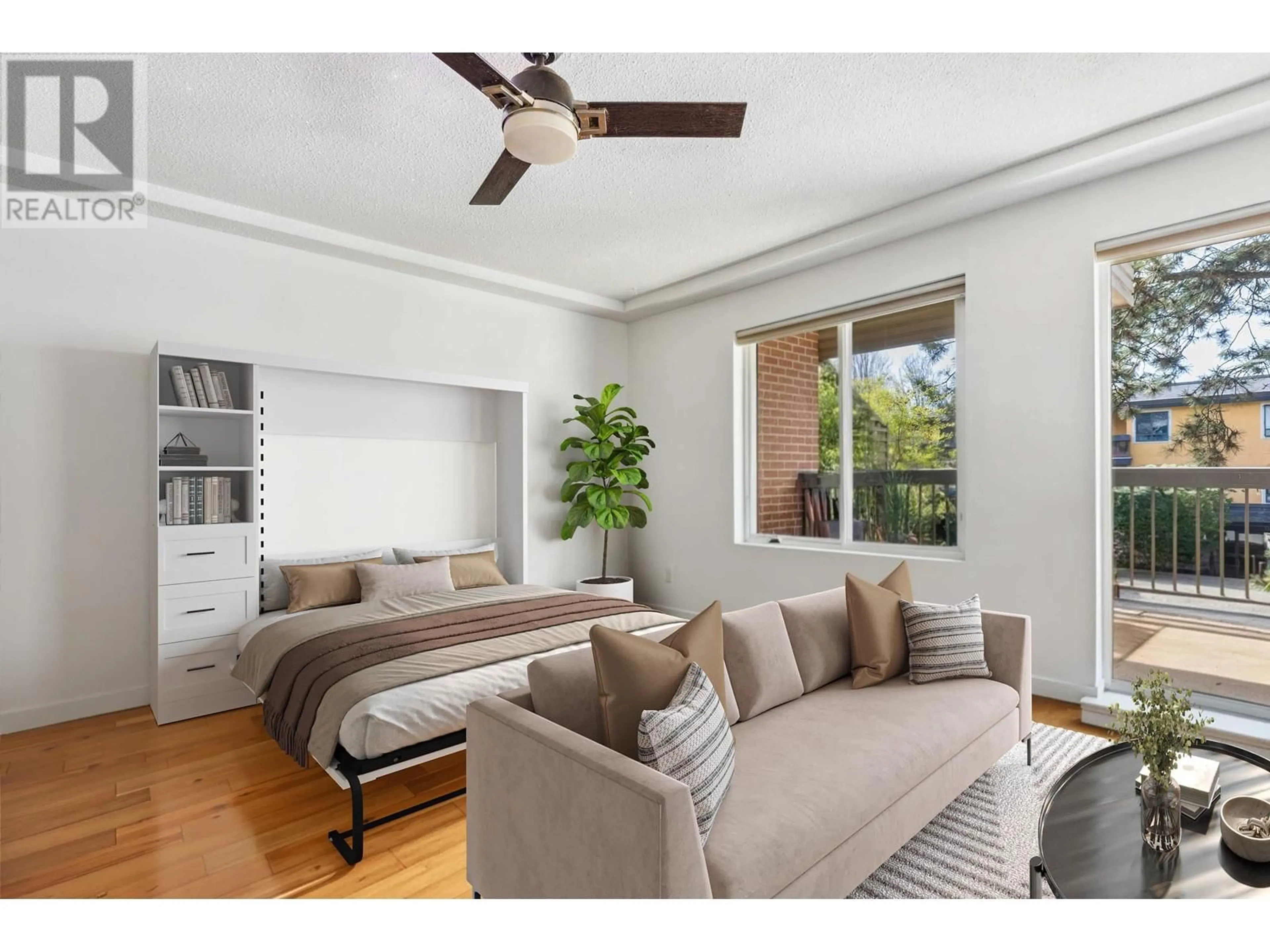 Living room with furniture, wood/laminate floor for 101 - 222 TEMPLETON DRIVE, Vancouver British Columbia V5L3E4