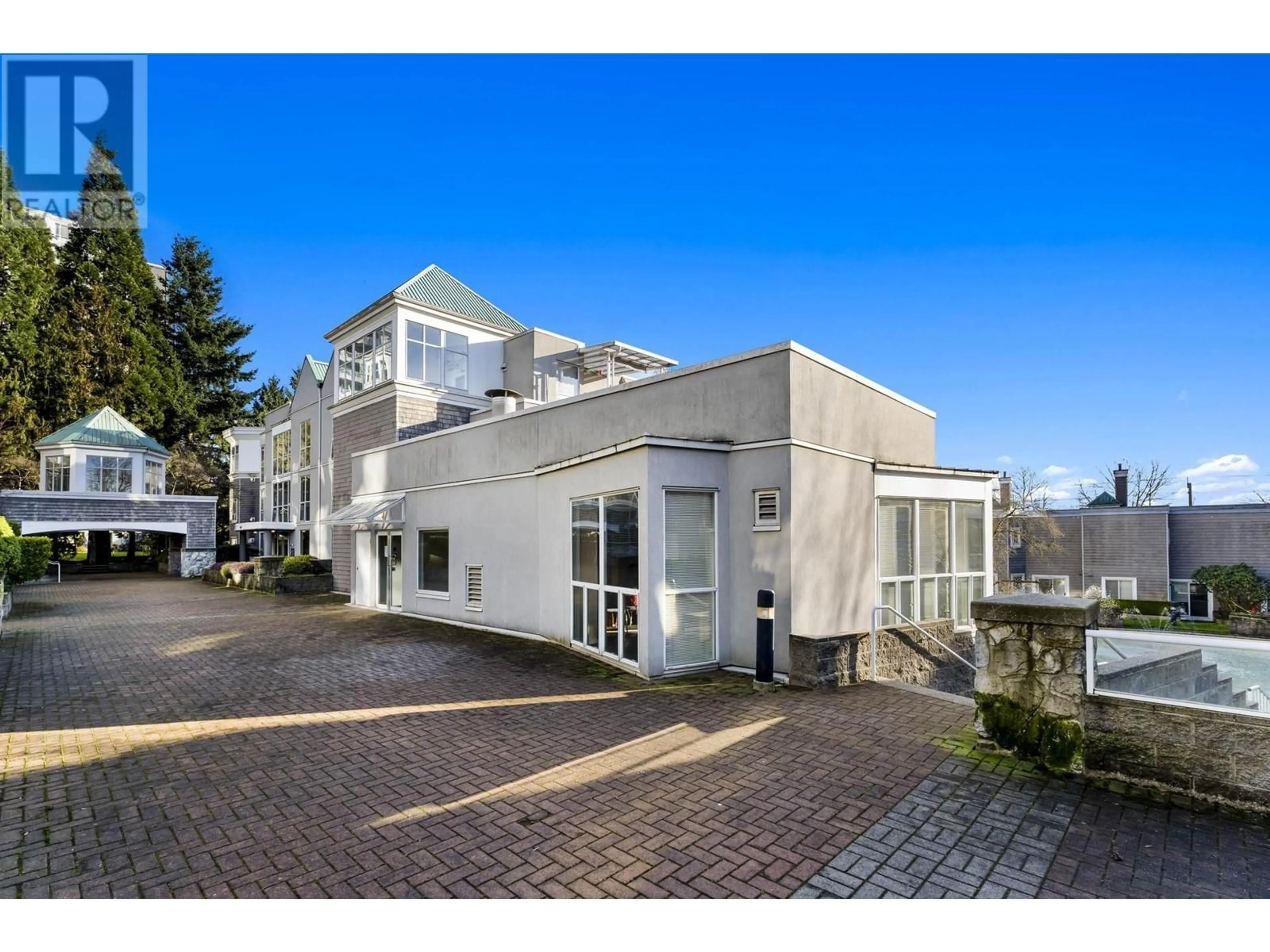 A pic from outside/outdoor area/front of a property/back of a property/a pic from drone, building for 312 - 8450 JELLICOE STREET, Vancouver British Columbia V5S4S9