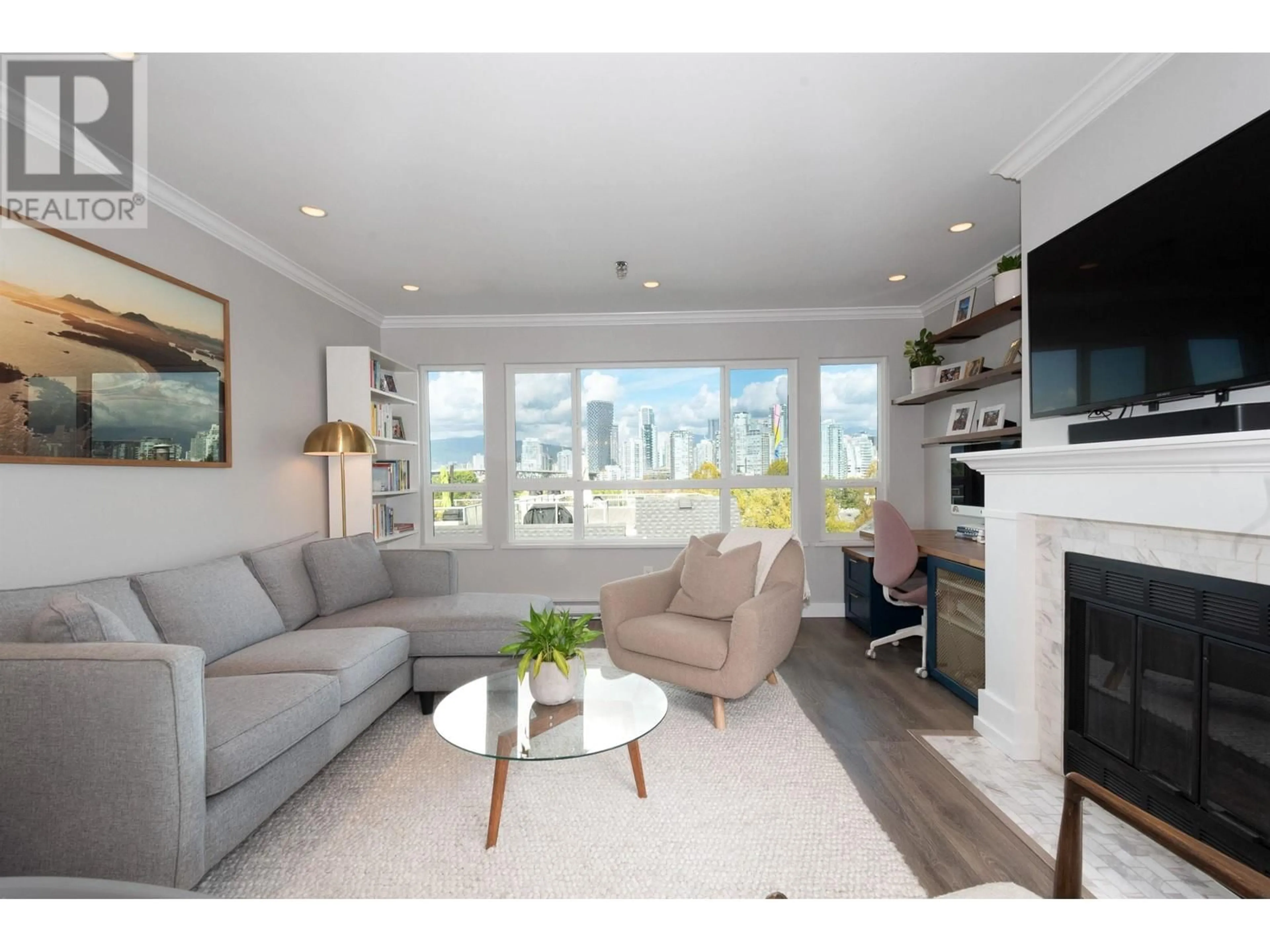Living room with furniture, wood/laminate floor for 307 - 1166 6TH AVENUE, Vancouver British Columbia V6H1A4