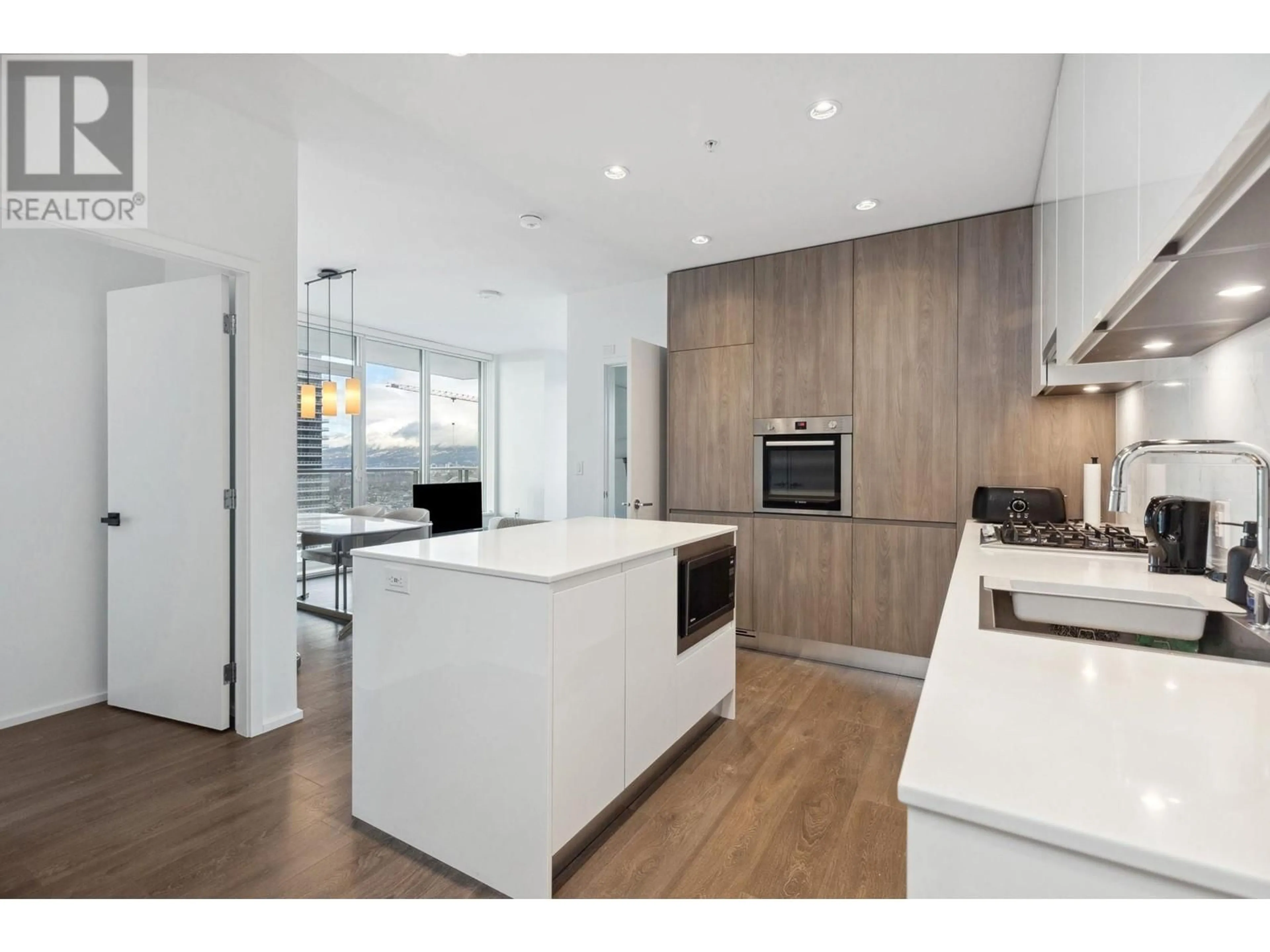 Open concept kitchen, wood/laminate floor for 2407 - 4650 BRENTWOOD BOULEVARD, Burnaby British Columbia V5C0M3