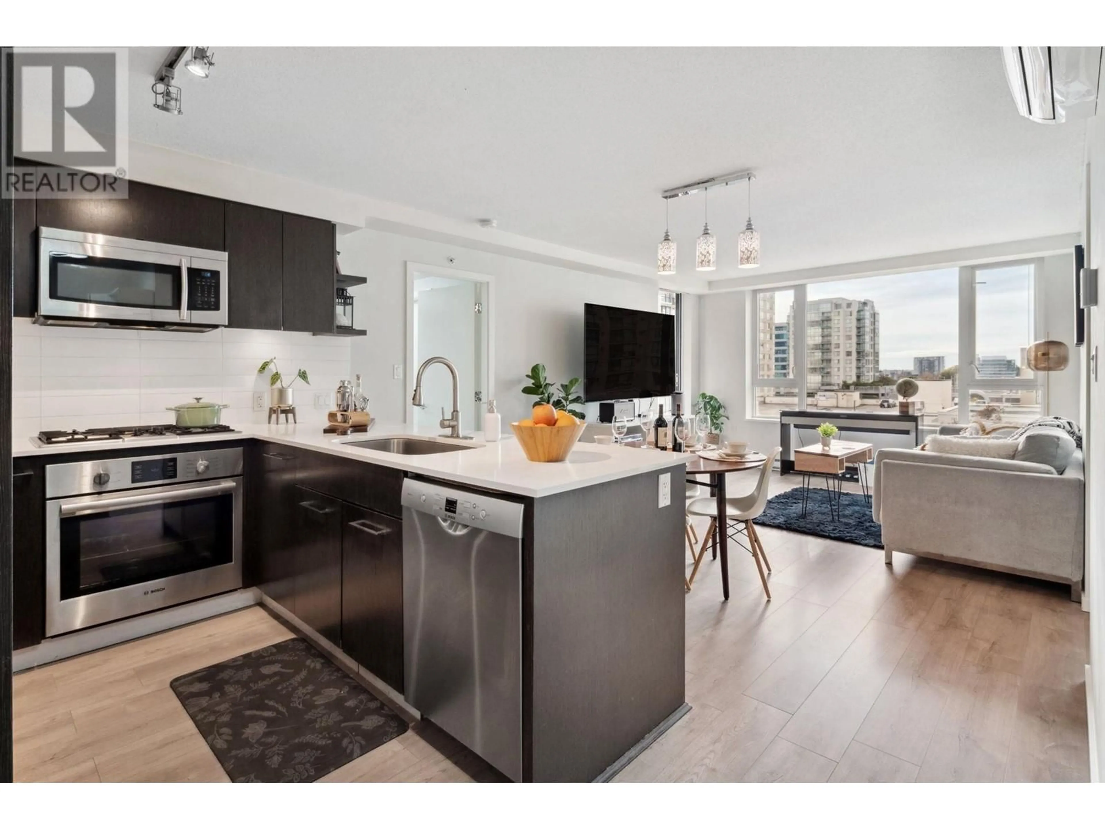 Open concept kitchen, wood/laminate floor for 901 - 7888 ACKROYD ROAD, Richmond British Columbia V6X0K6
