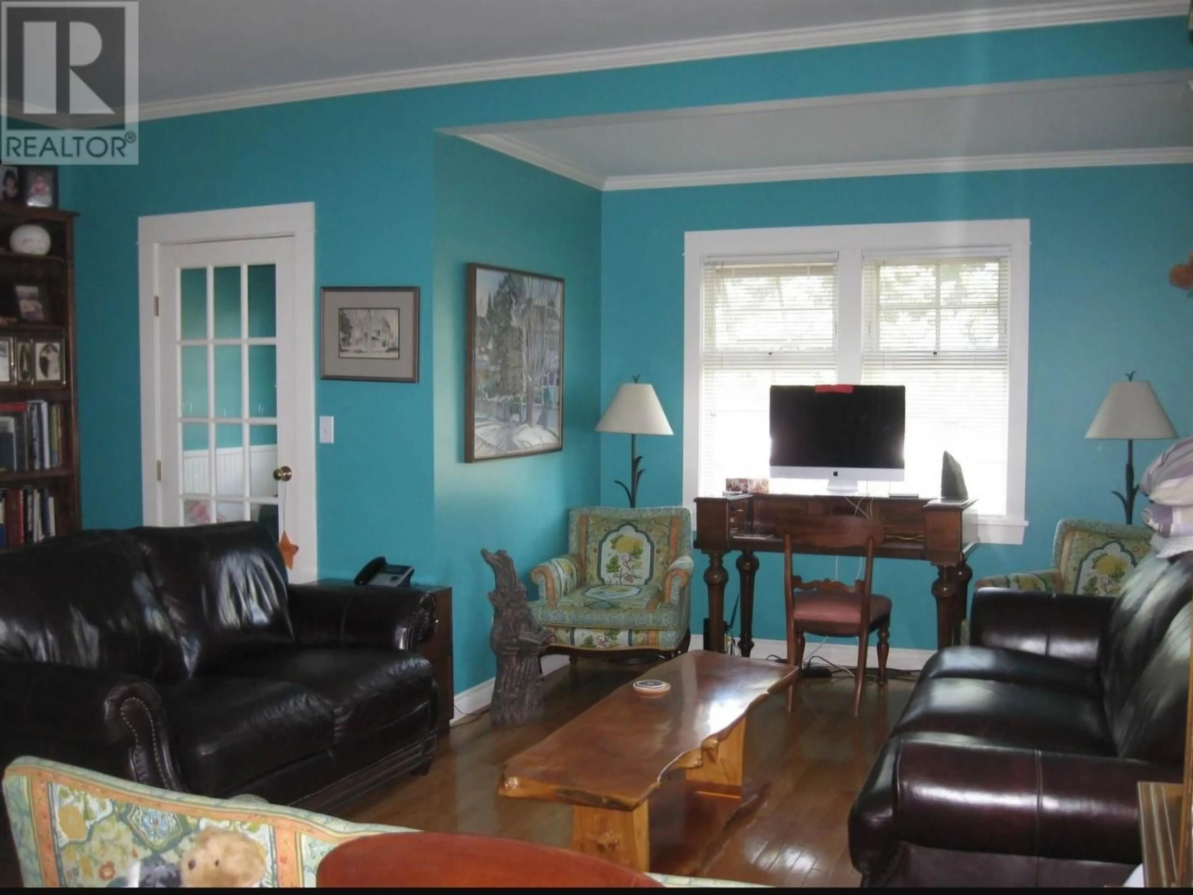 Living room with furniture, wood/laminate floor for 162 DOUGLAS STREET, Vanderhoof British Columbia V0J3A0