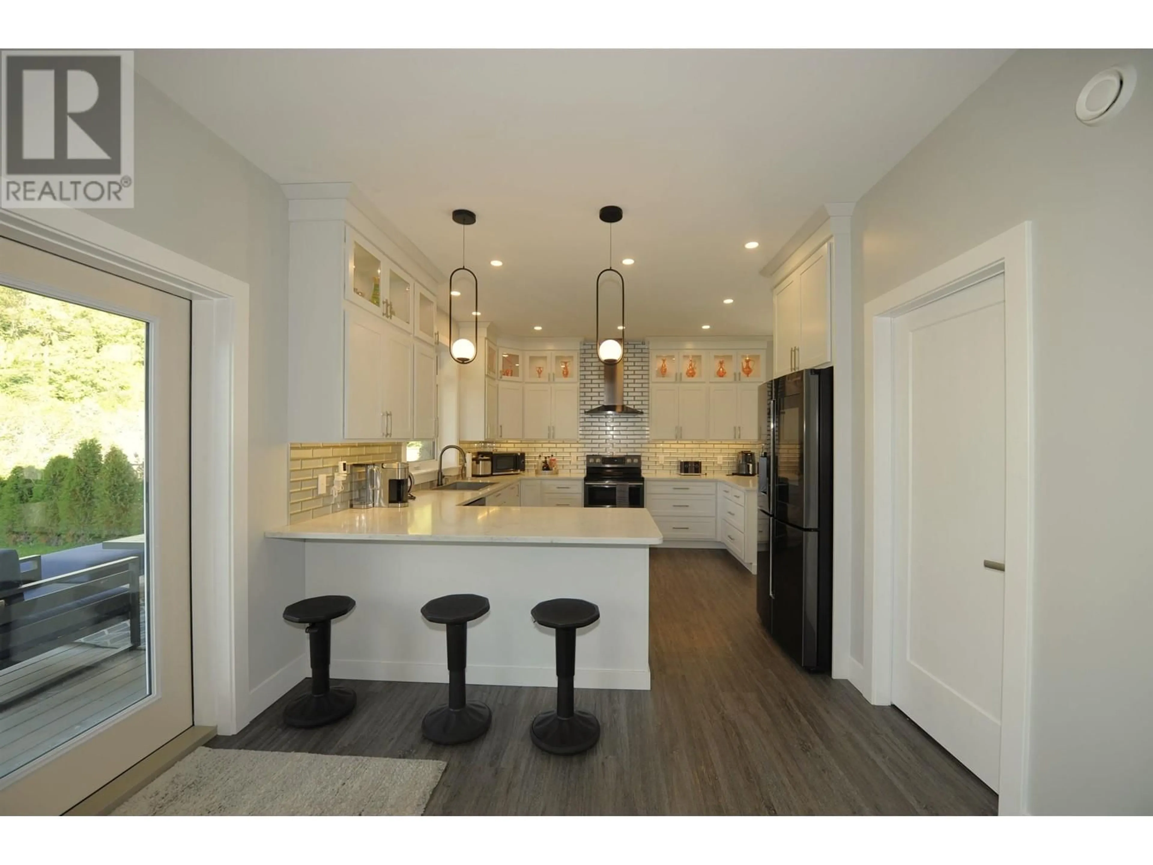 Open concept kitchen, wood/laminate floor for 4624 MCCONNELL AVENUE, Terrace British Columbia V8G5N2
