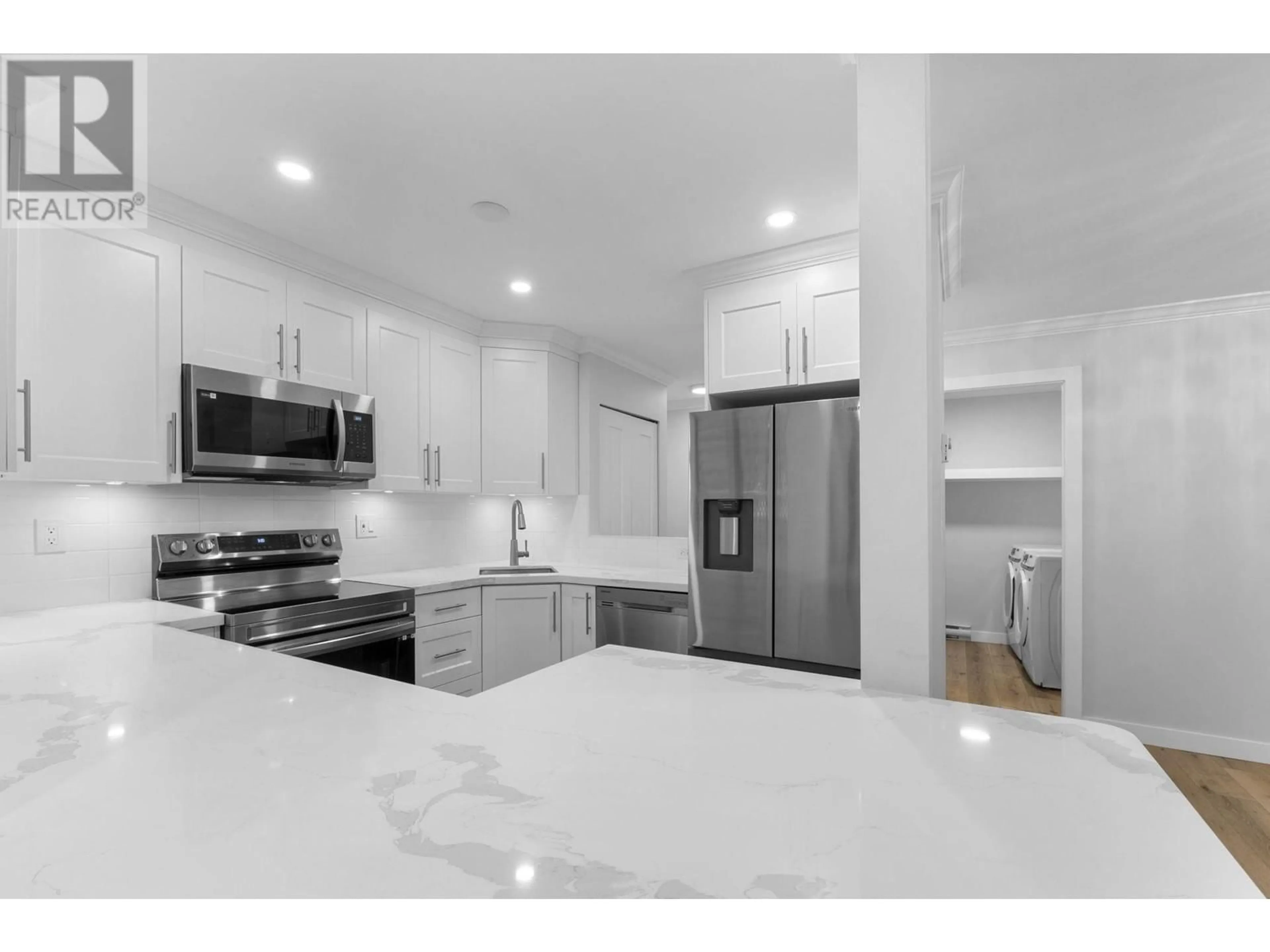 Open concept kitchen, unknown for 102 - 9152 SATURNA DRIVE, Burnaby British Columbia V3J7K2
