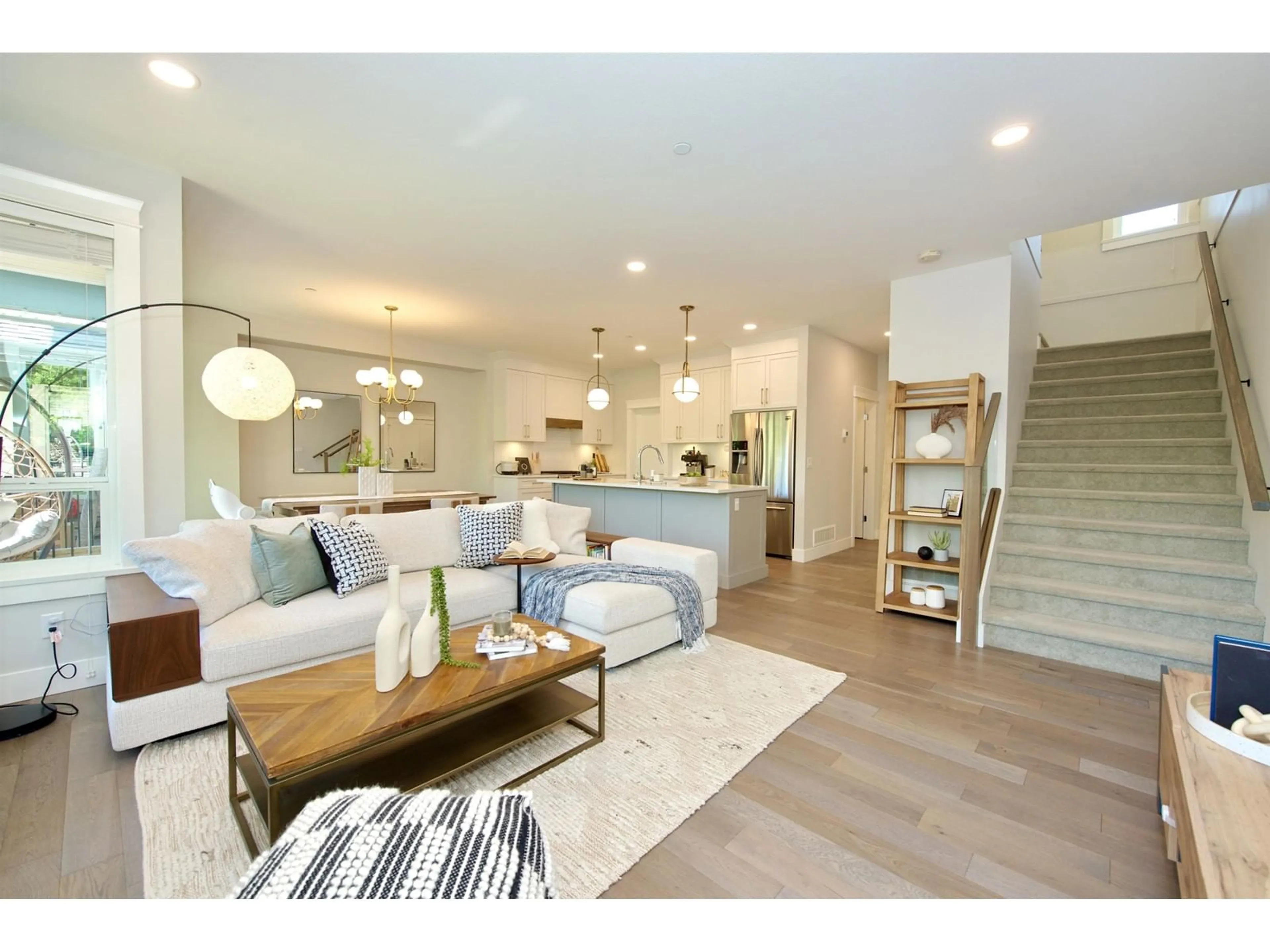 Open concept kitchen, wood/laminate floor for 107 - 8217 204B, Langley British Columbia V2Y0Z8