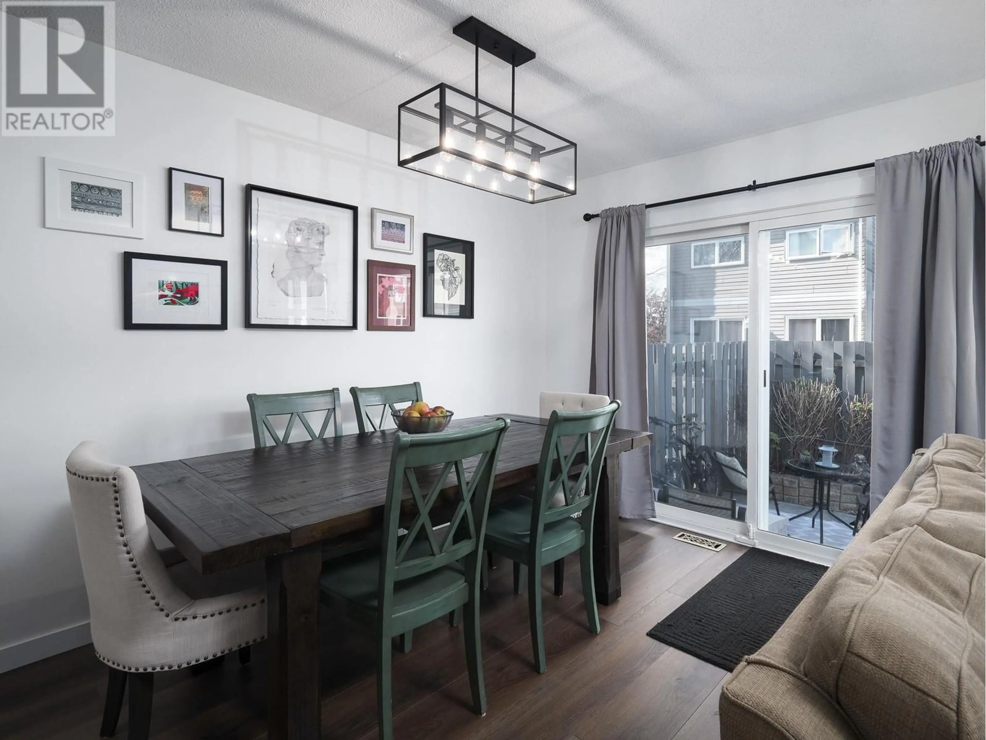 Dining room, wood/laminate floor for 317 - 2550 OSPIKA BOULEVARD, Prince George British Columbia V2N3T2