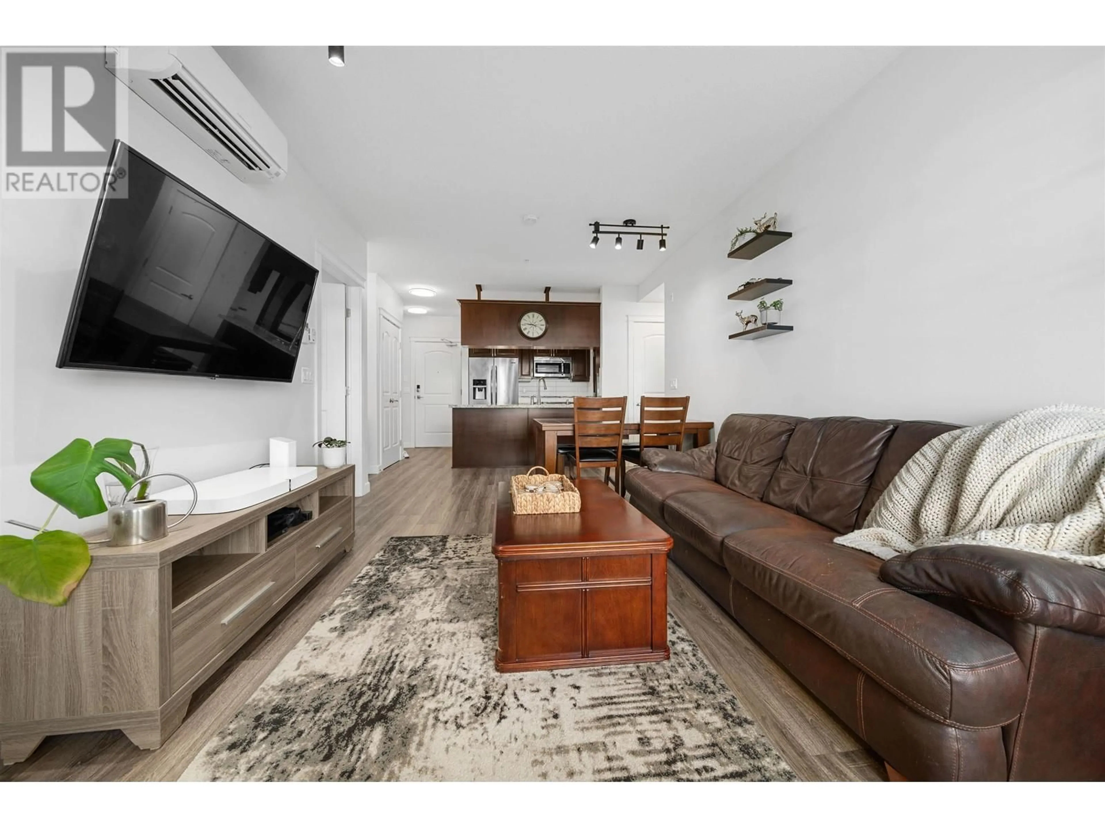 Living room with furniture, wood/laminate floor for 313 - 12635 190A STREET, Pitt Meadows British Columbia V3Y0E8