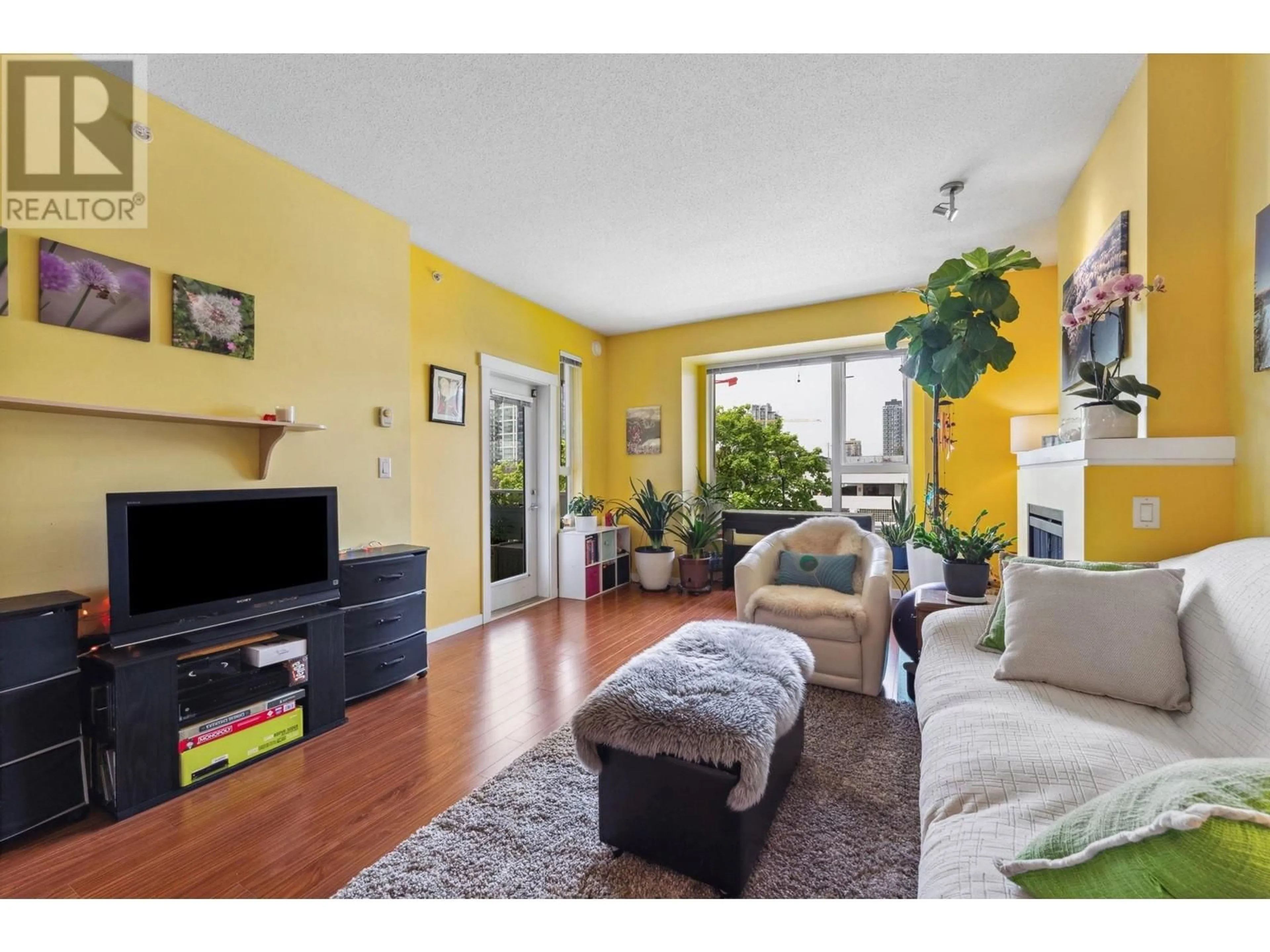 Living room with furniture, wood/laminate floor for 410 - 4723 DAWSON STREET, Burnaby British Columbia V5C0A7