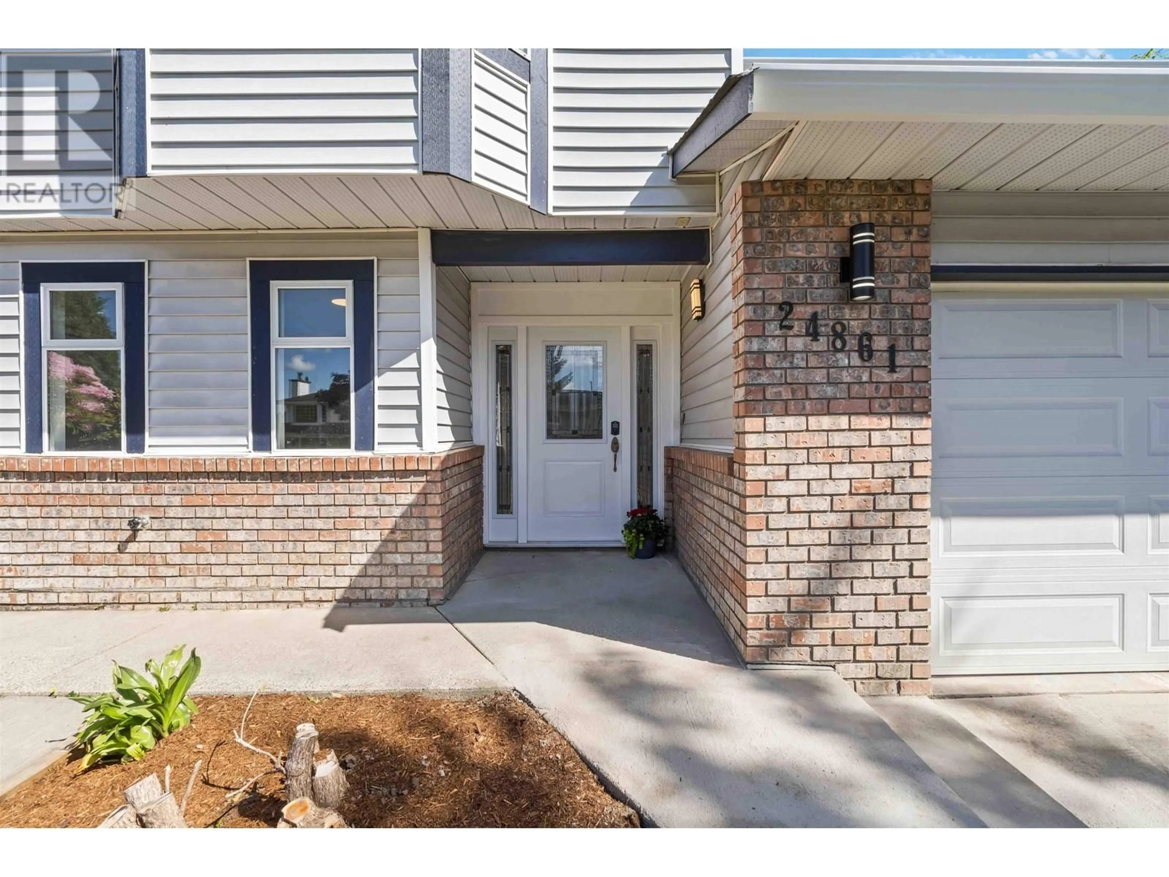 Home with brick exterior material, street for 24861 119 AVENUE, Maple Ridge British Columbia V4R1Z1