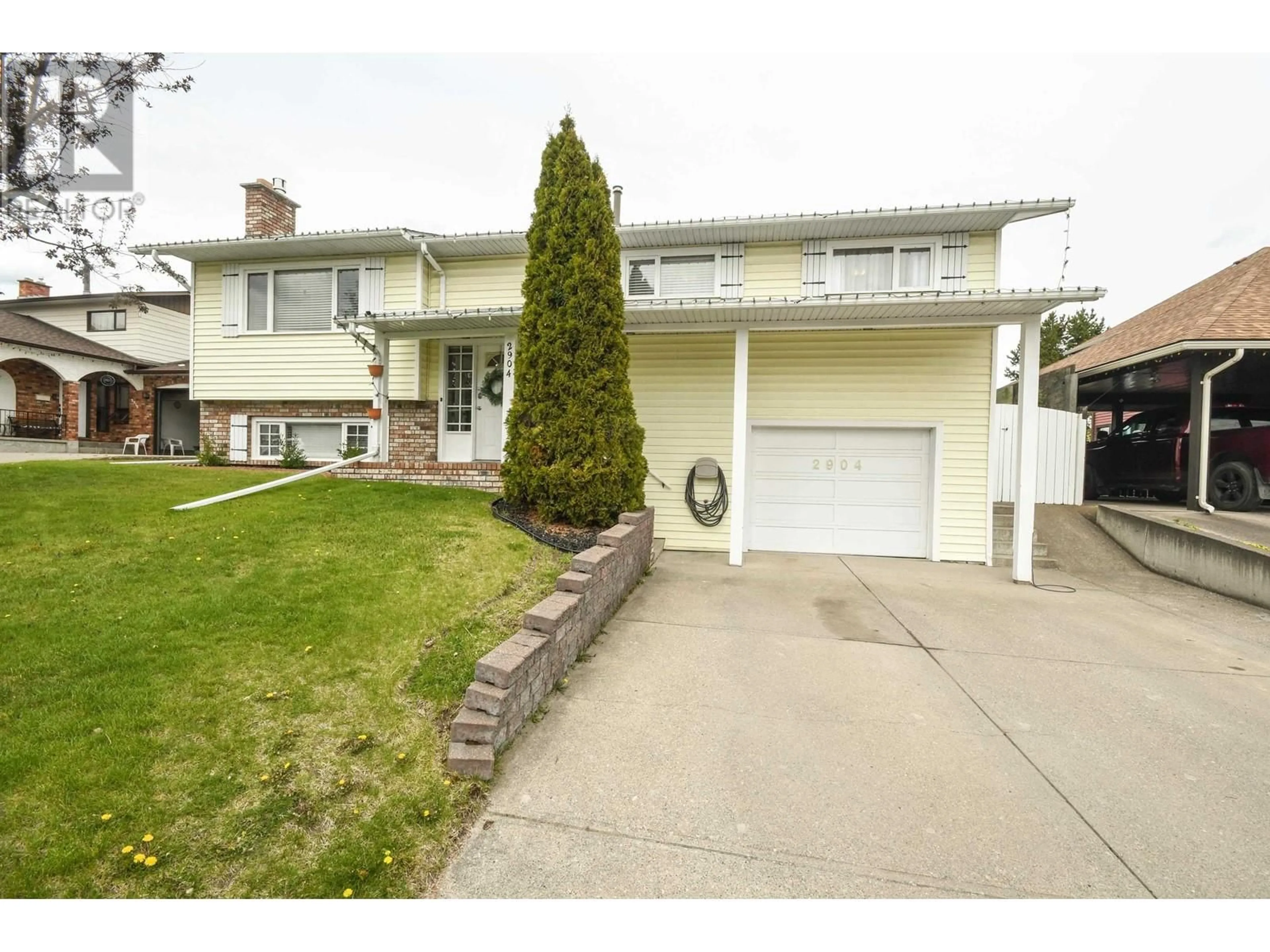Home with vinyl exterior material, street for 2904 CHRISTOPHER CRESCENT, Prince George British Columbia V2N4S4