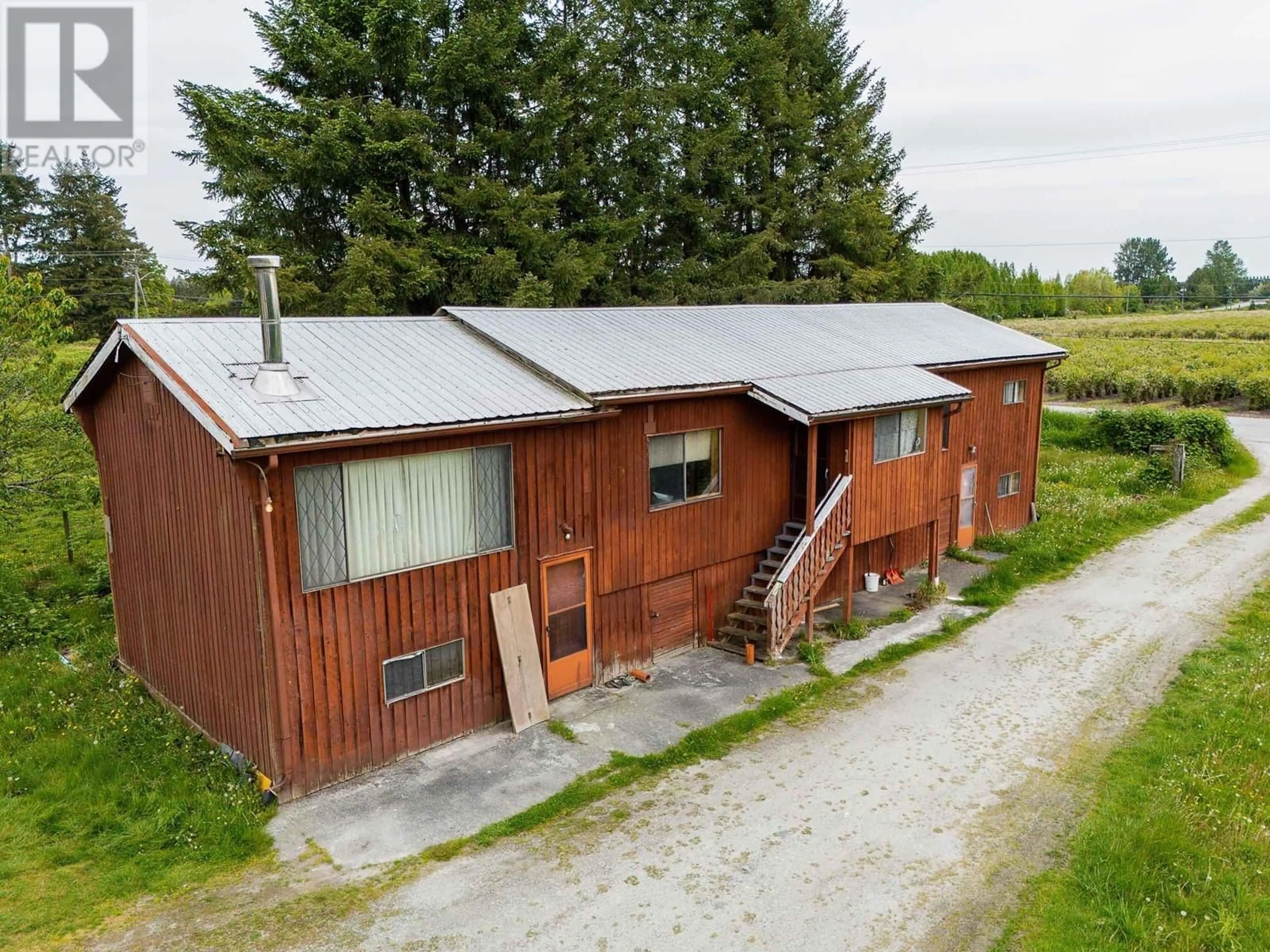 A pic from outside/outdoor area/front of a property/back of a property/a pic from drone, building for 19141 MCQUARRIE ROAD, Pitt Meadows British Columbia V3Y1Z1