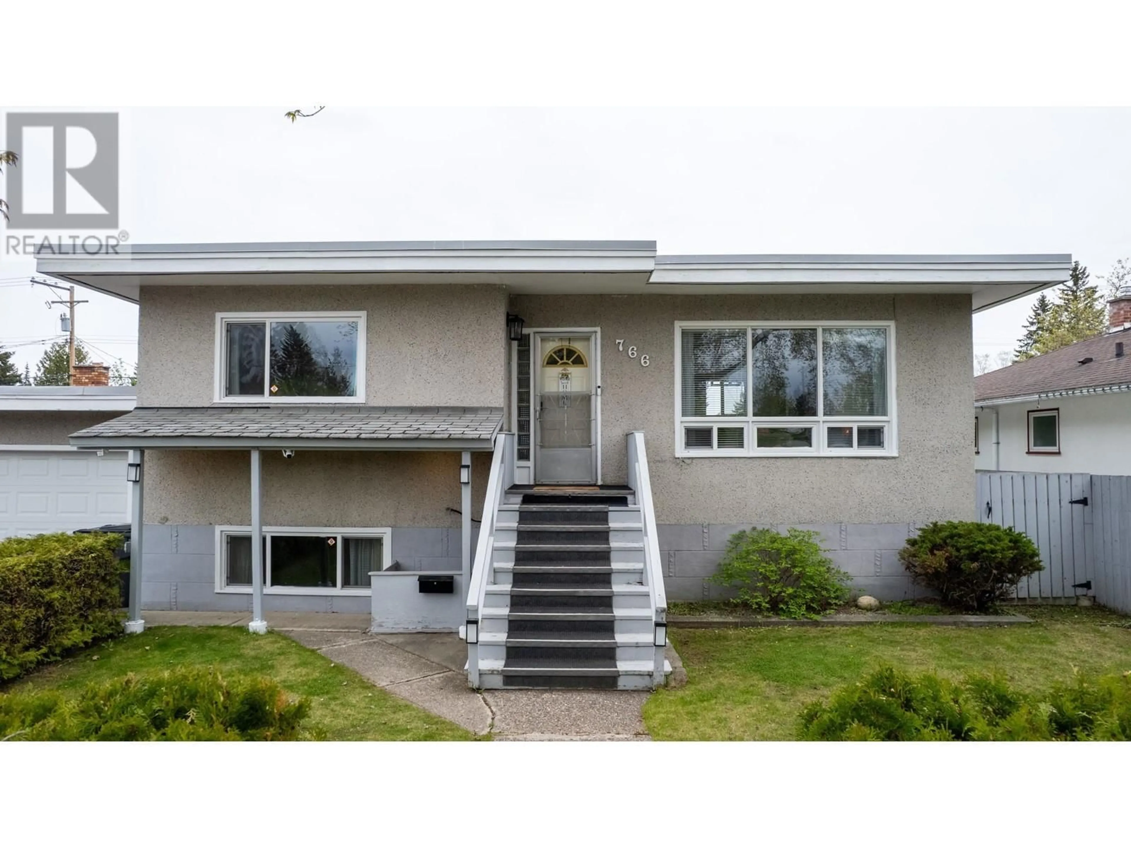 Home with vinyl exterior material, street for 766 CARNEY STREET, Prince George British Columbia V2M2X6