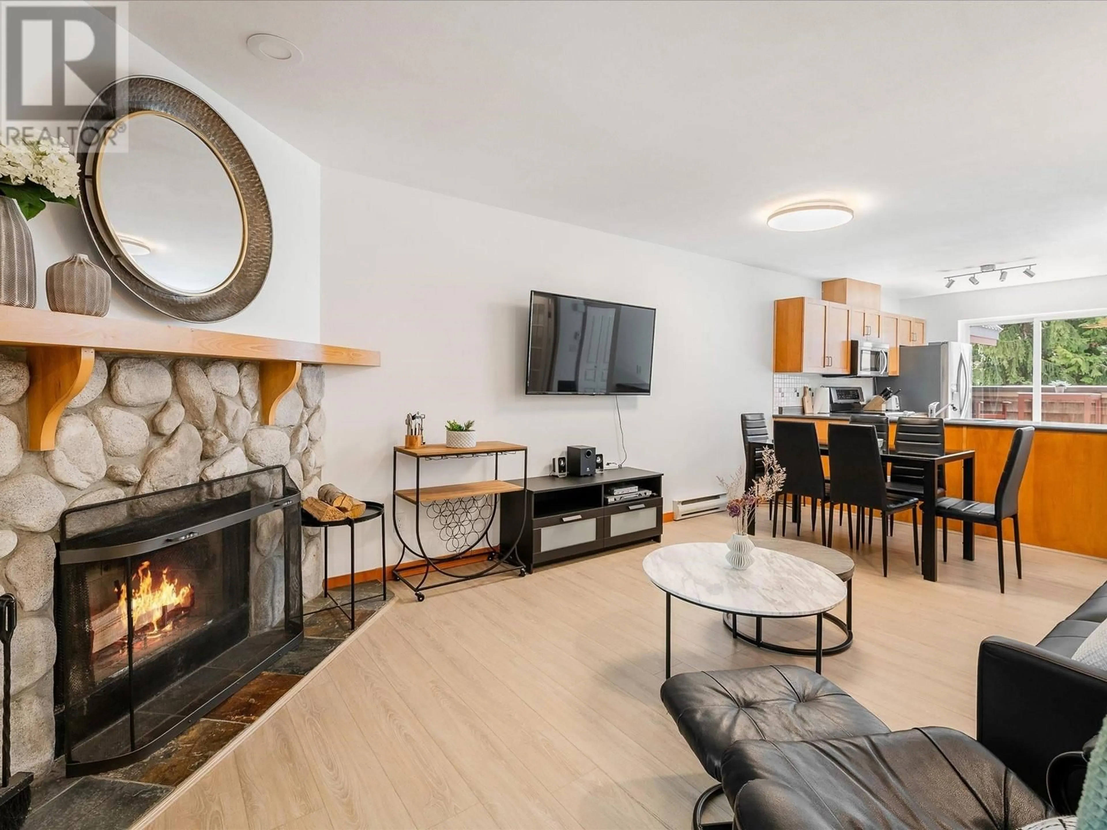 Living room with furniture, unknown for 202 - 2222 CASTLE DRIVE, Whistler British Columbia V8E0L7