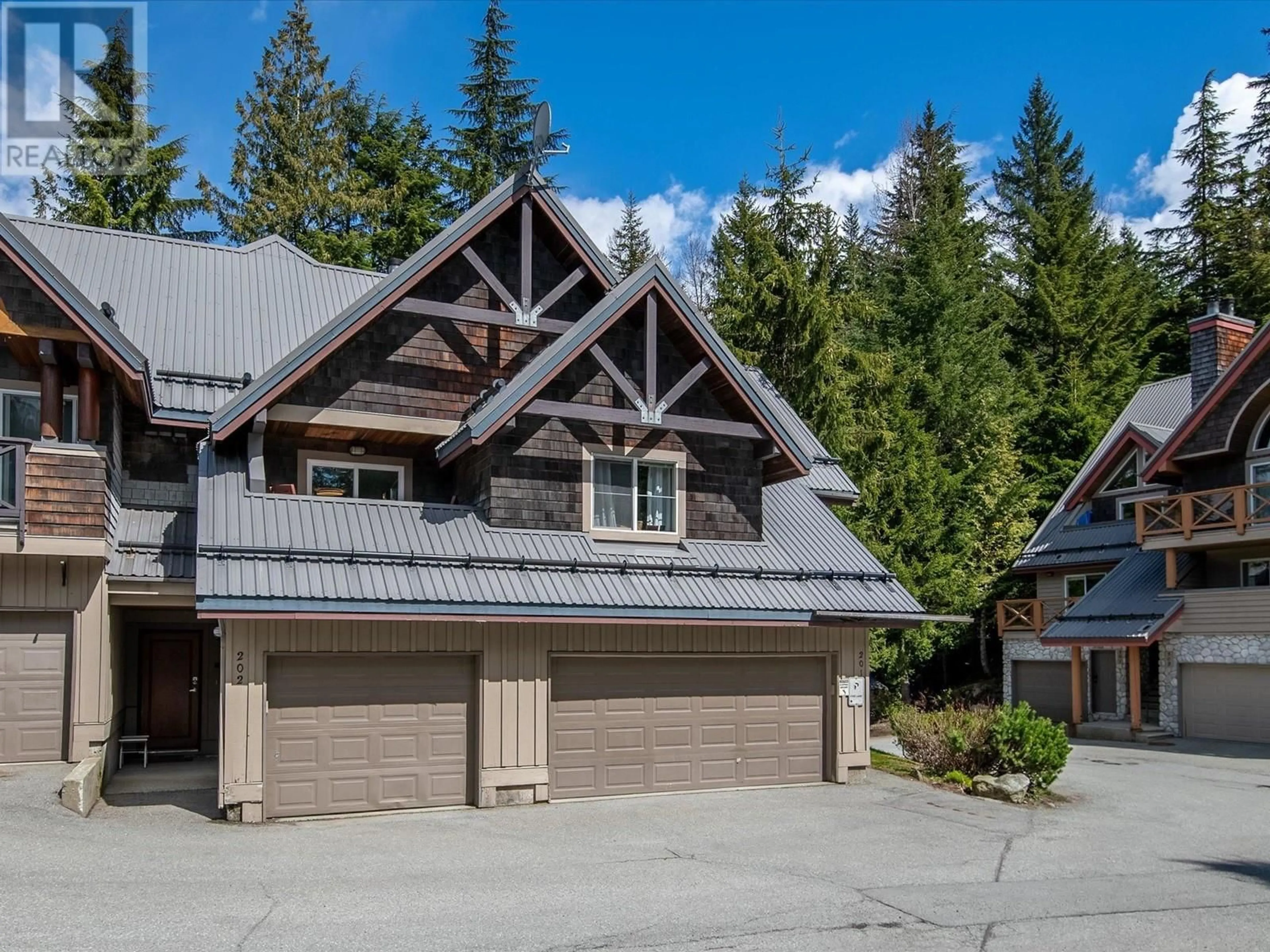 A pic from outside/outdoor area/front of a property/back of a property/a pic from drone, unknown for 202 - 2222 CASTLE DRIVE, Whistler British Columbia V8E0L7