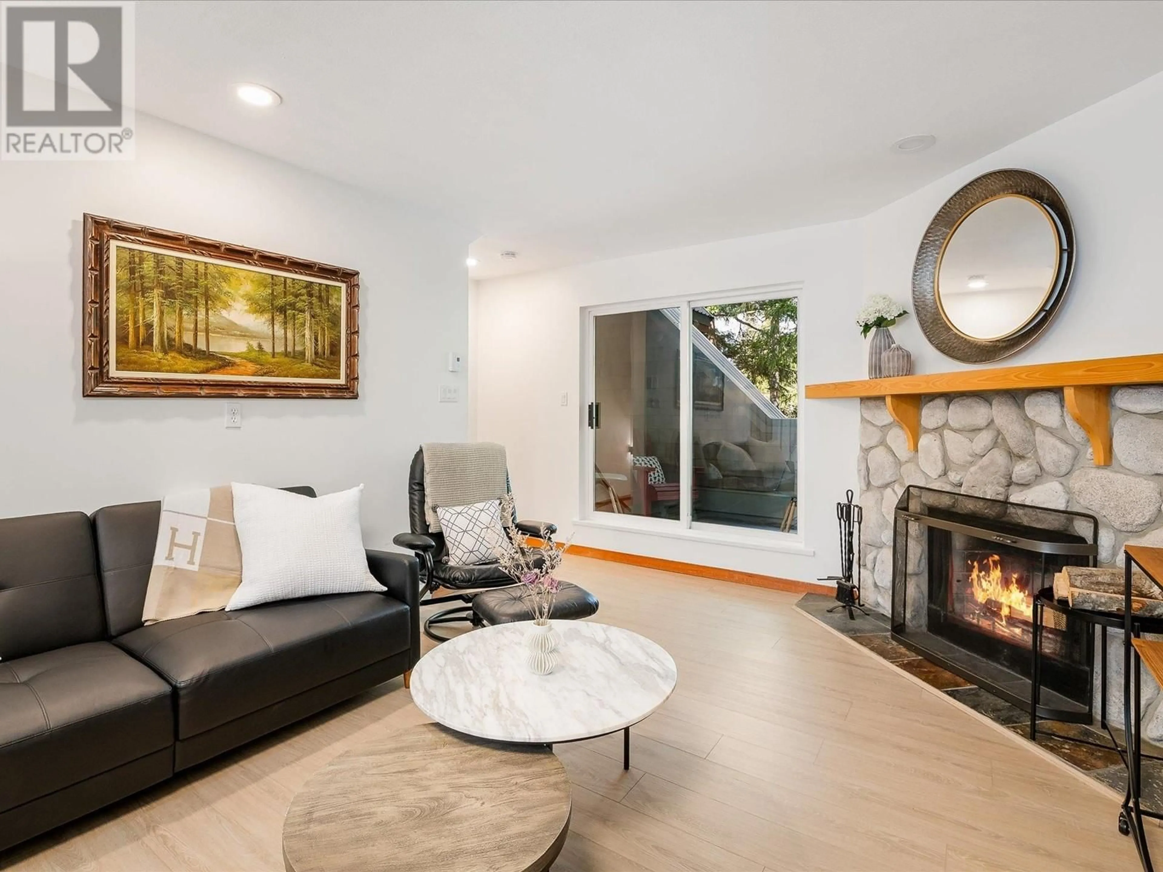 Living room with furniture, unknown for 202 - 2222 CASTLE DRIVE, Whistler British Columbia V8E0L7