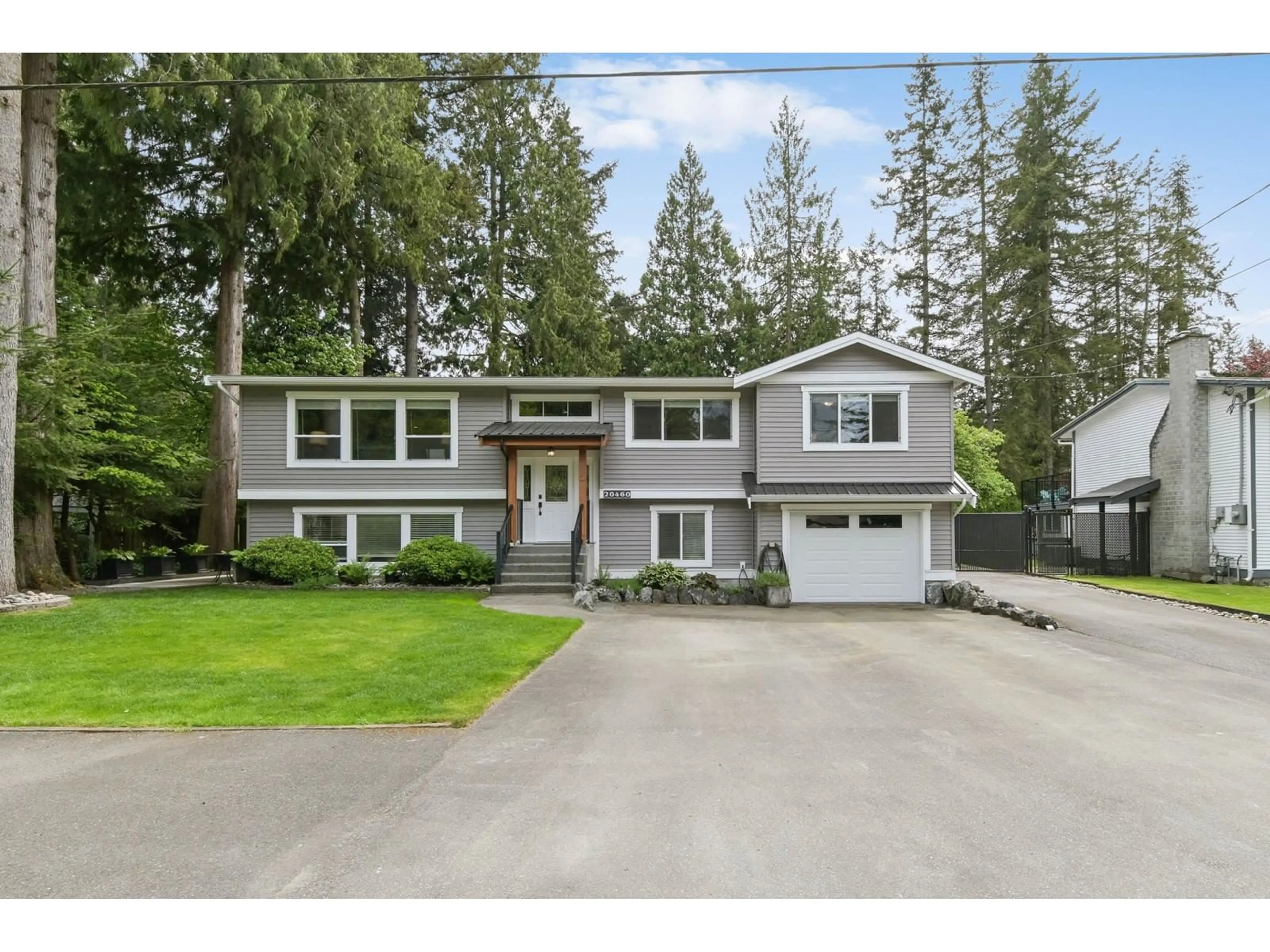 Home with vinyl exterior material, street for 20460 42A, Langley British Columbia V3A3B7