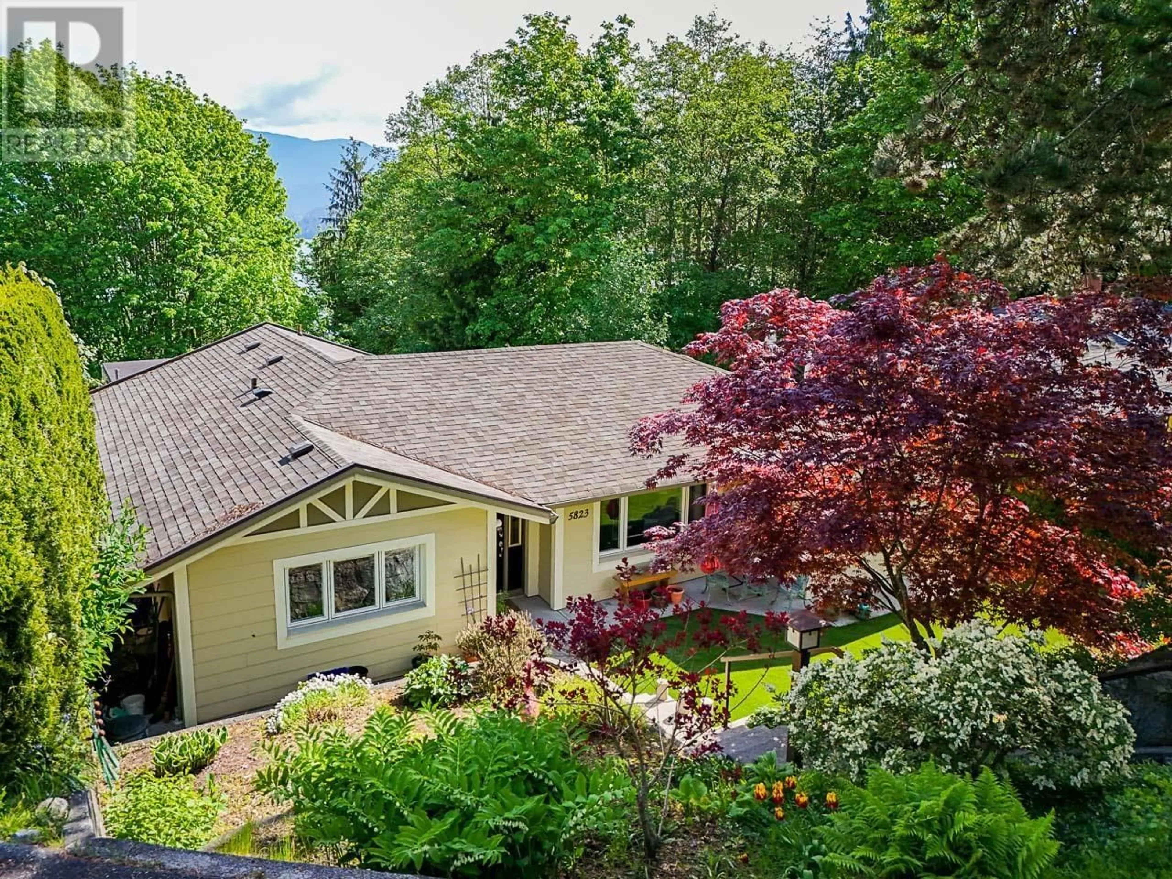 A pic from outside/outdoor area/front of a property/back of a property/a pic from drone, mountain view for 5823 HIGHFIELD DRIVE, Burnaby British Columbia V5B1E4