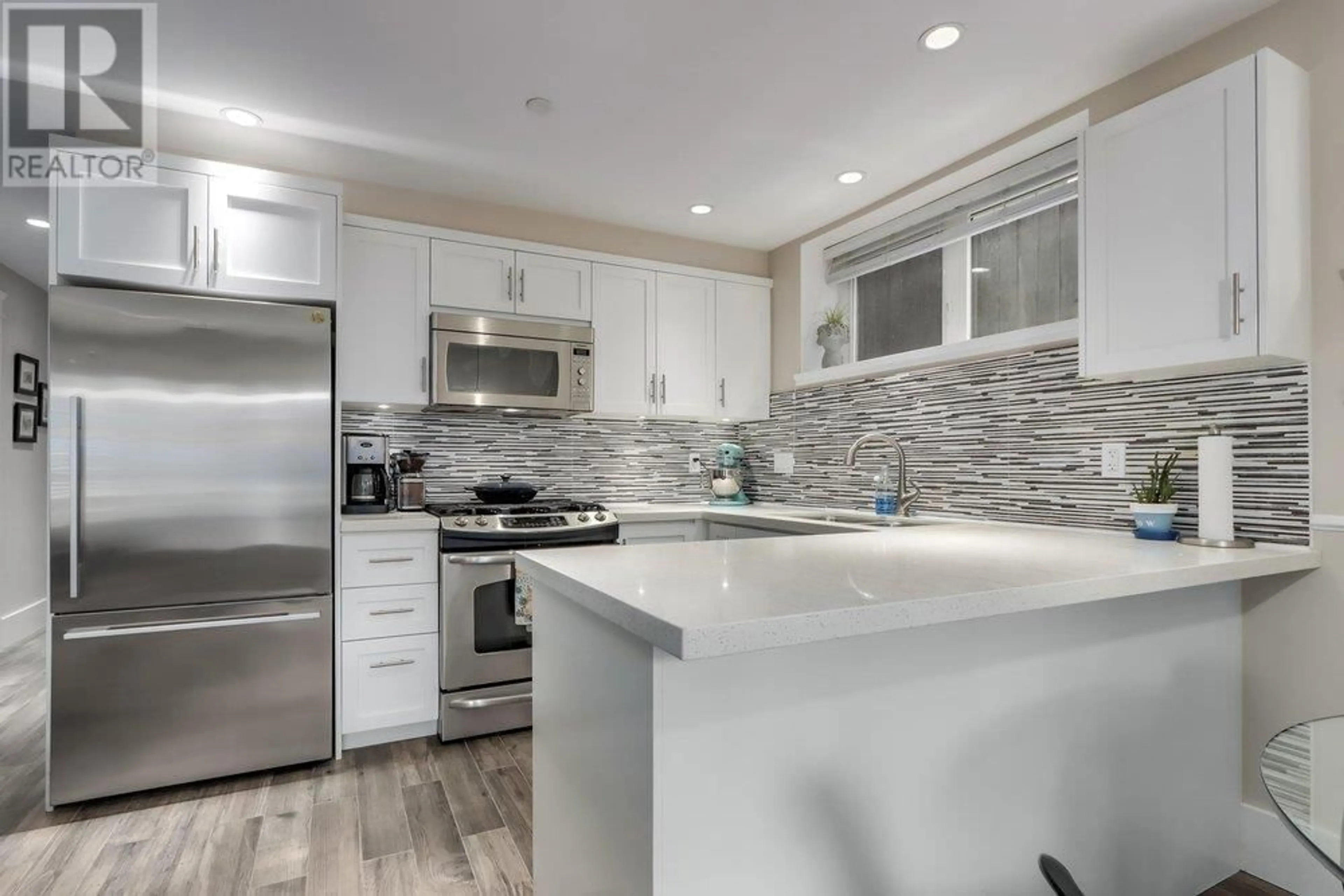 Contemporary kitchen, ceramic/tile floor for 317 16TH AVENUE, Vancouver British Columbia V5Y1Z1