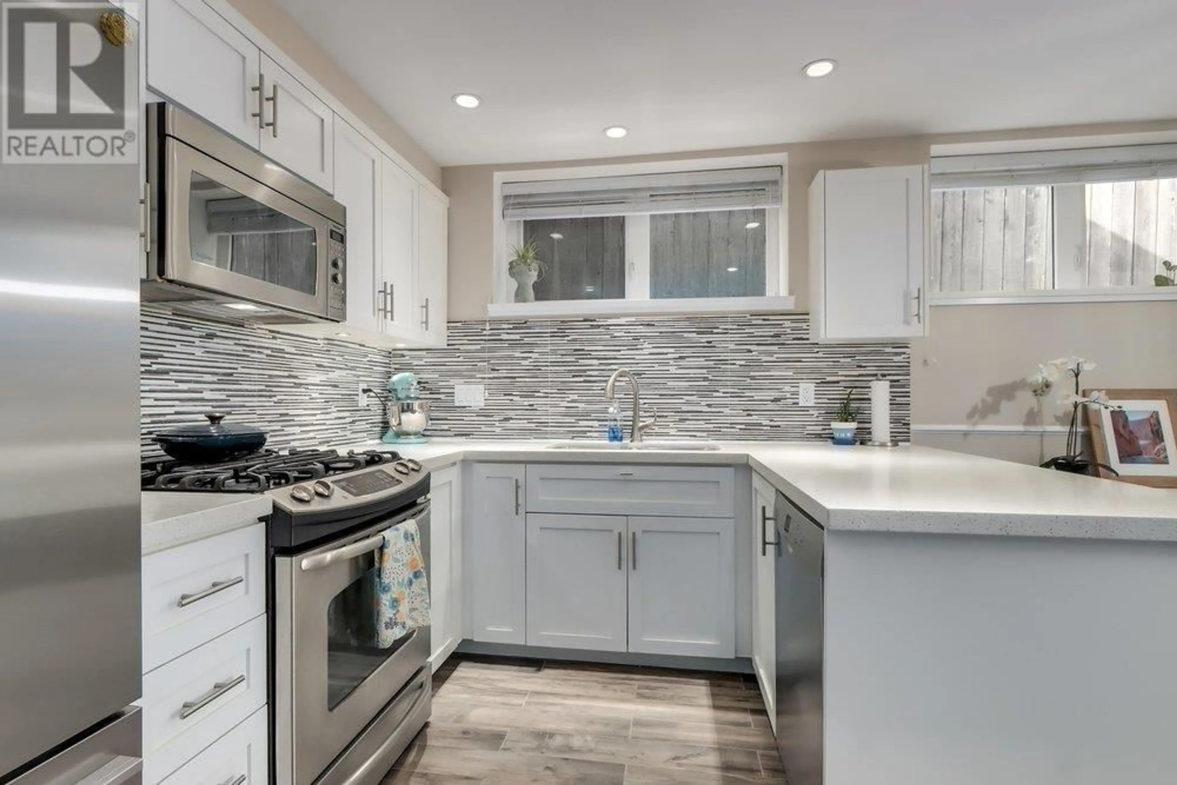 Contemporary kitchen, ceramic/tile floor for 317 16TH AVENUE, Vancouver British Columbia V5Y1Z1