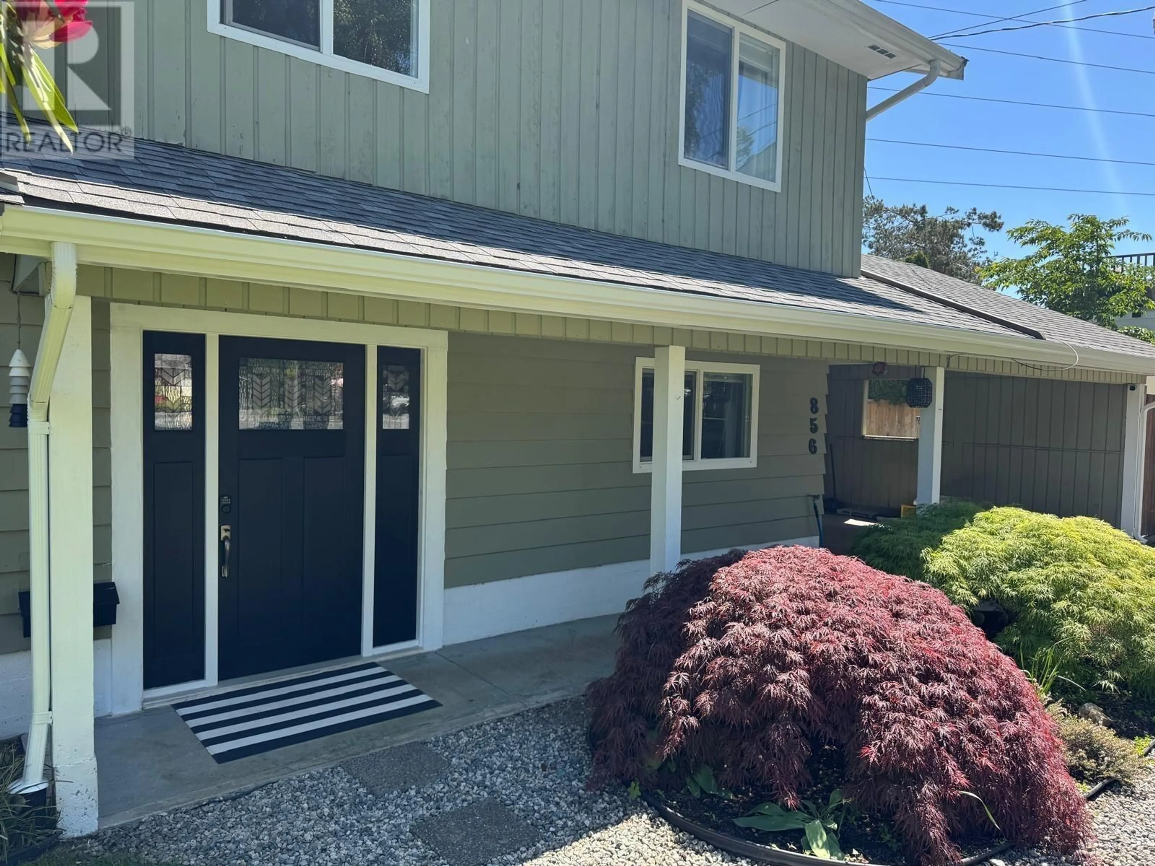 Home with vinyl exterior material, street for 856 53A STREET, Delta British Columbia V4M3C9