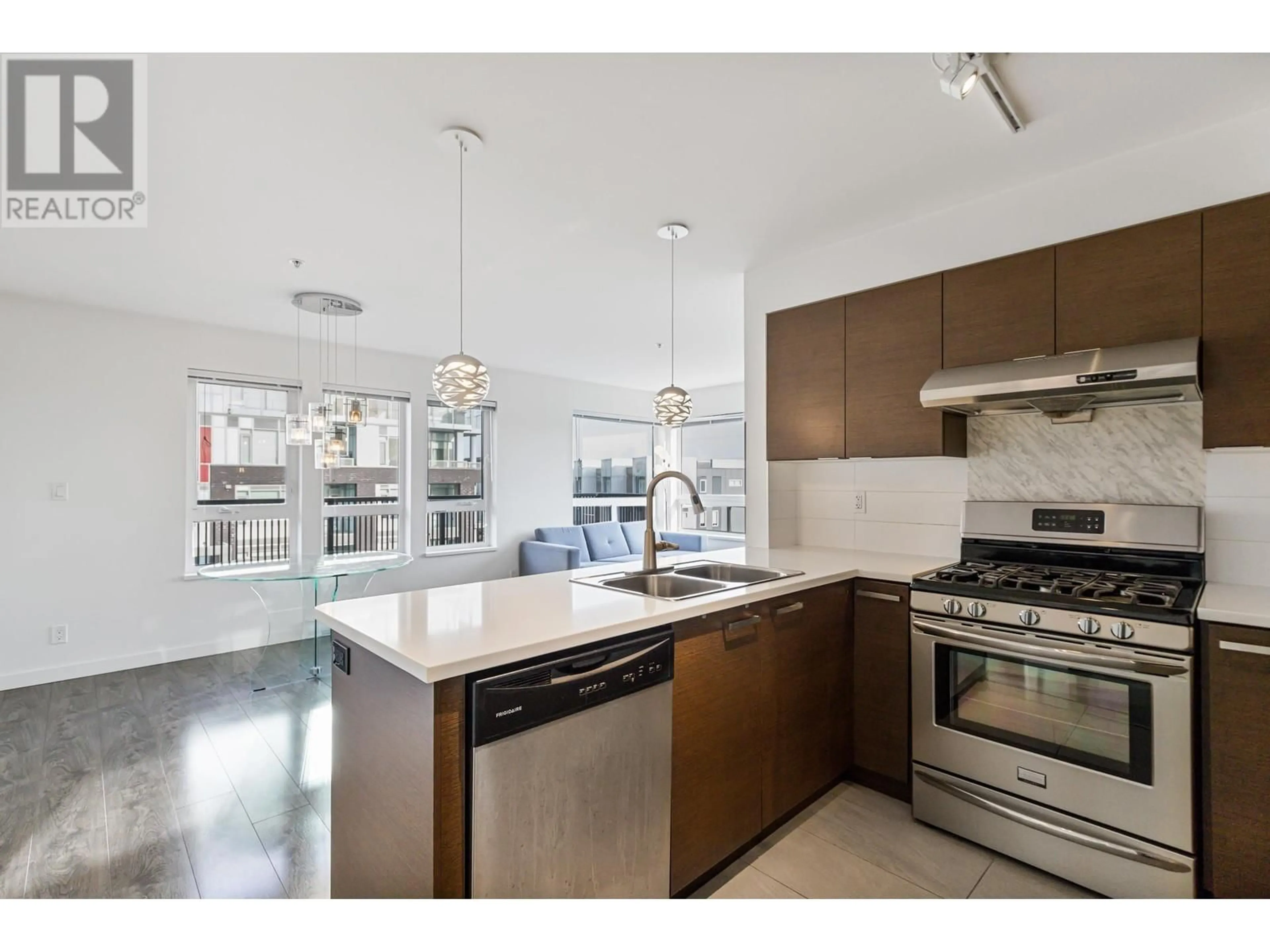 Open concept kitchen, ceramic/tile floor for 203 - 12339 STEVESTON HIGHWAY, Richmond British Columbia V6W0B4