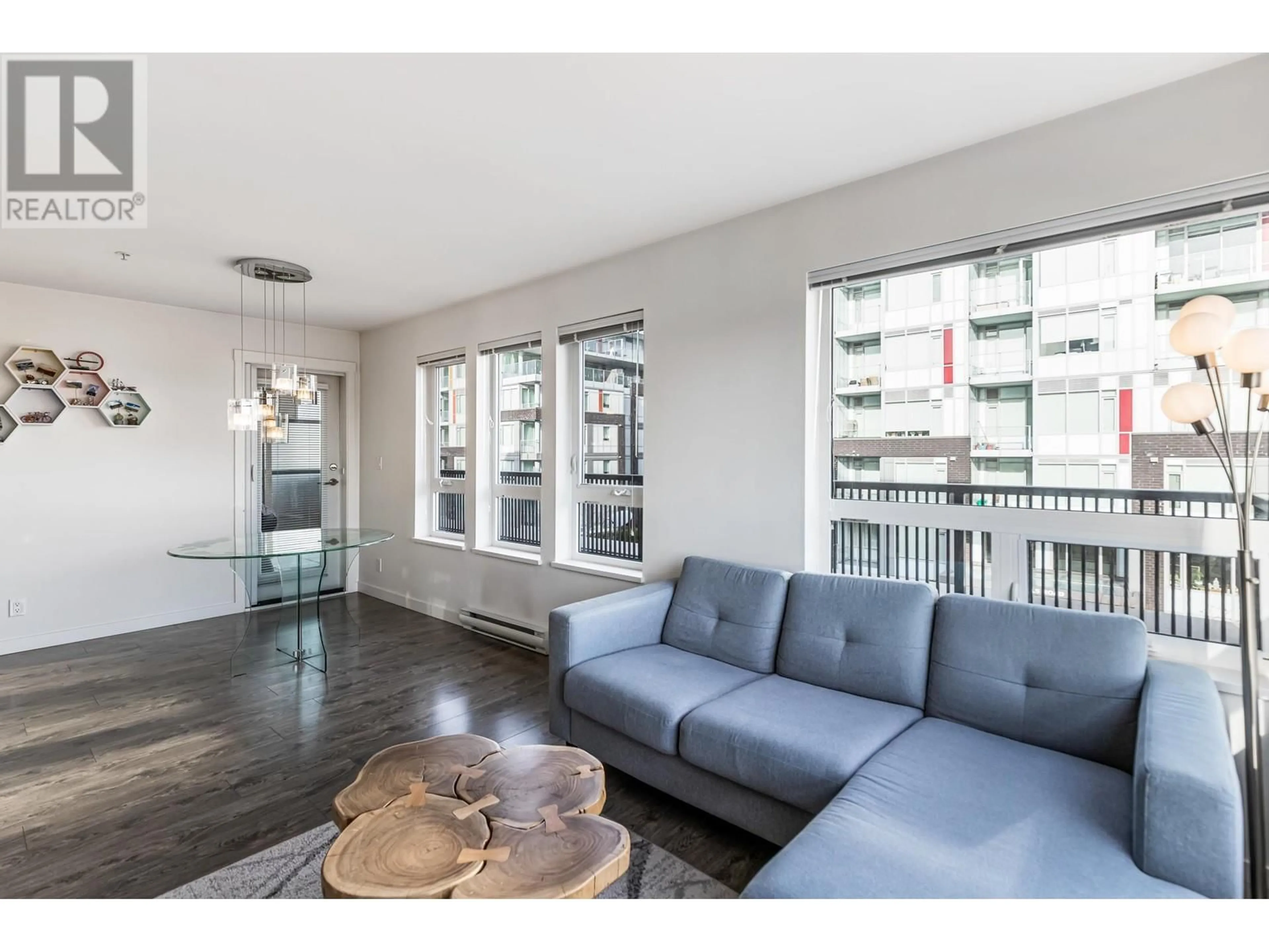 Living room with furniture, wood/laminate floor for 203 - 12339 STEVESTON HIGHWAY, Richmond British Columbia V6W0B4