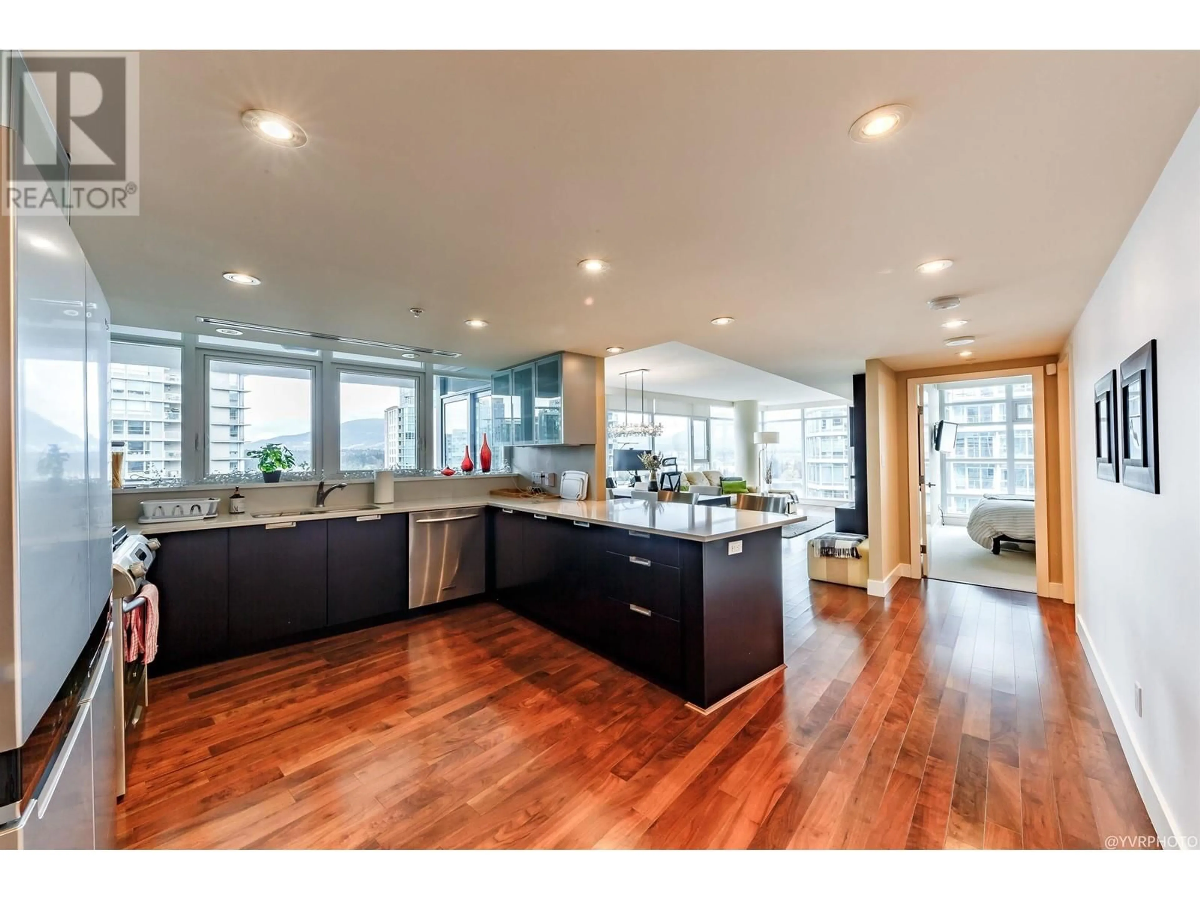 Open concept kitchen, wood/laminate floor for 2102 - 1205 HASTINGS STREET, Vancouver British Columbia V6E4T7