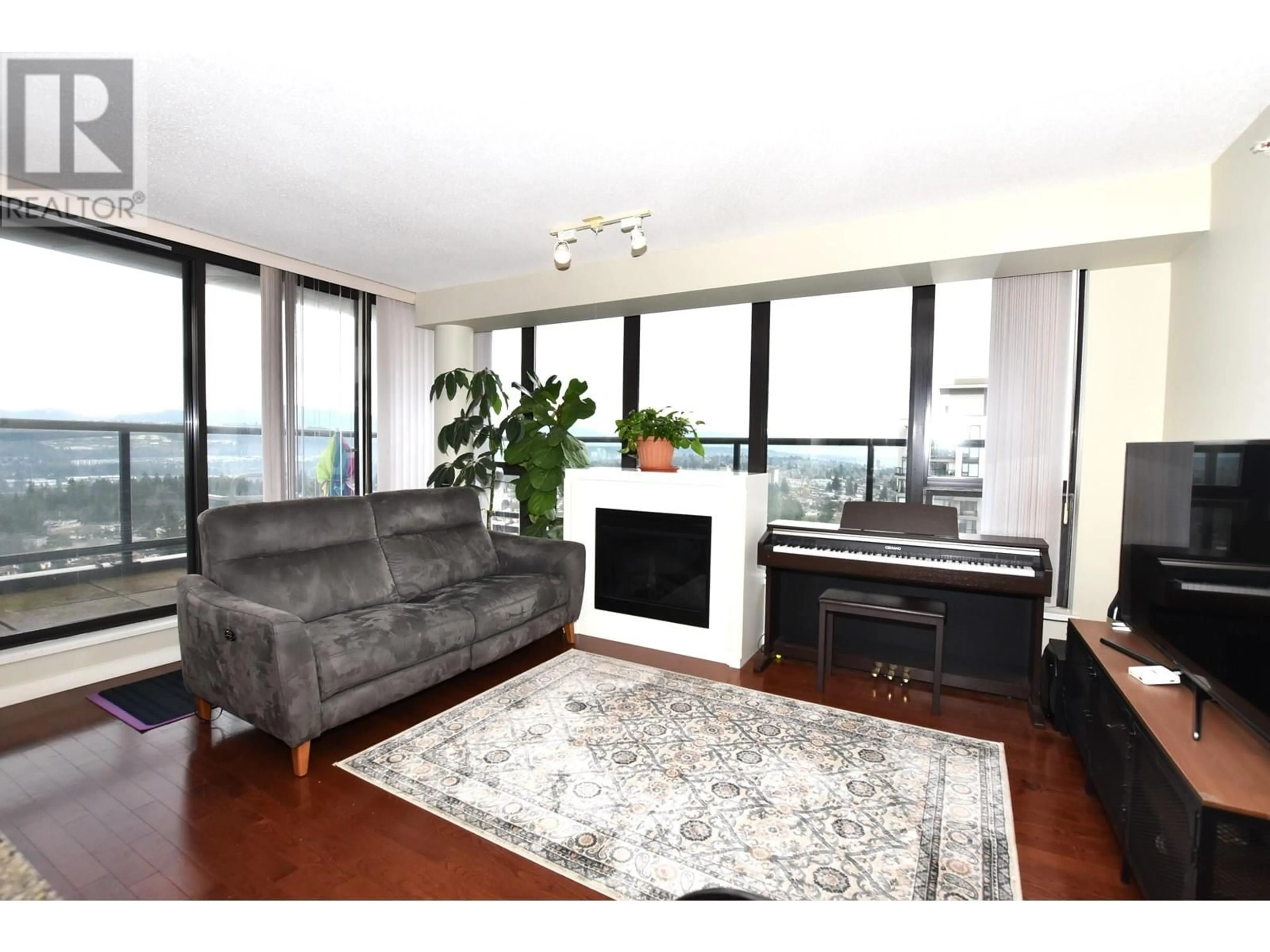 Living room with furniture, wood/laminate floor for 2803 - 7108 COLLIER STREET, Burnaby British Columbia V5E0A1