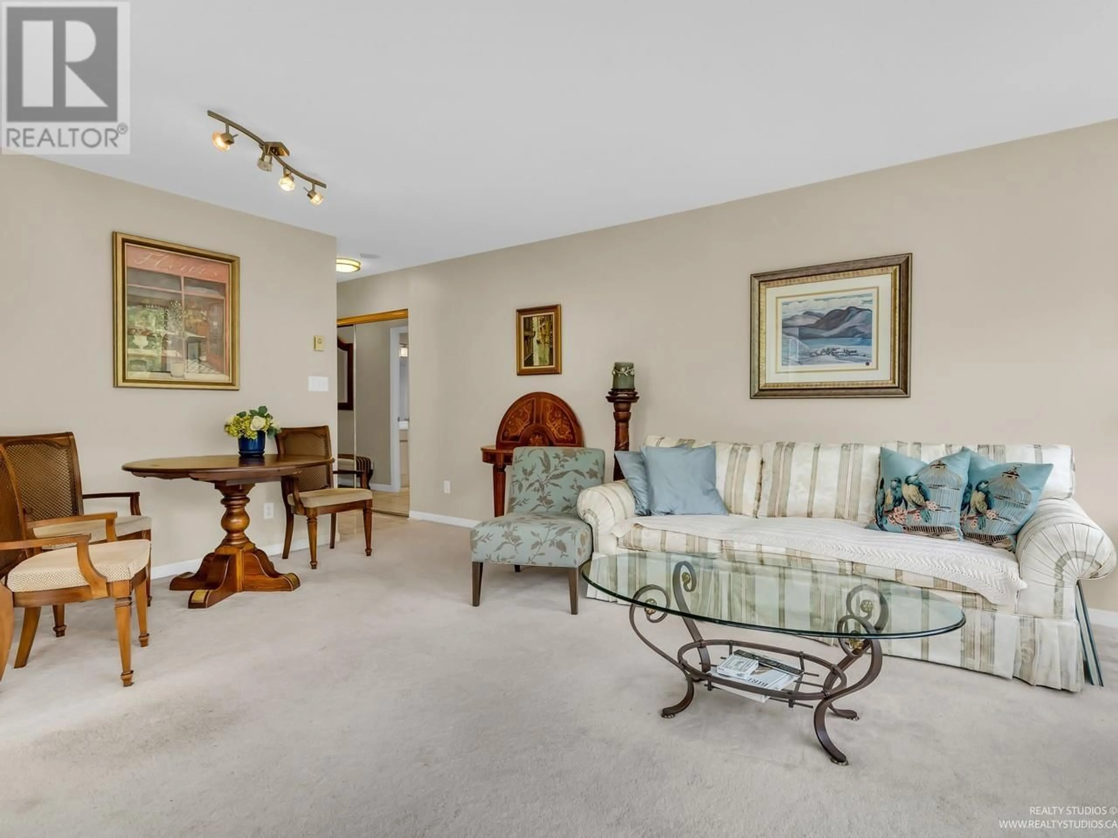 Living room with furniture, carpet floor for 413 - 1327 KEITH ROAD, North Vancouver British Columbia V7J1J3