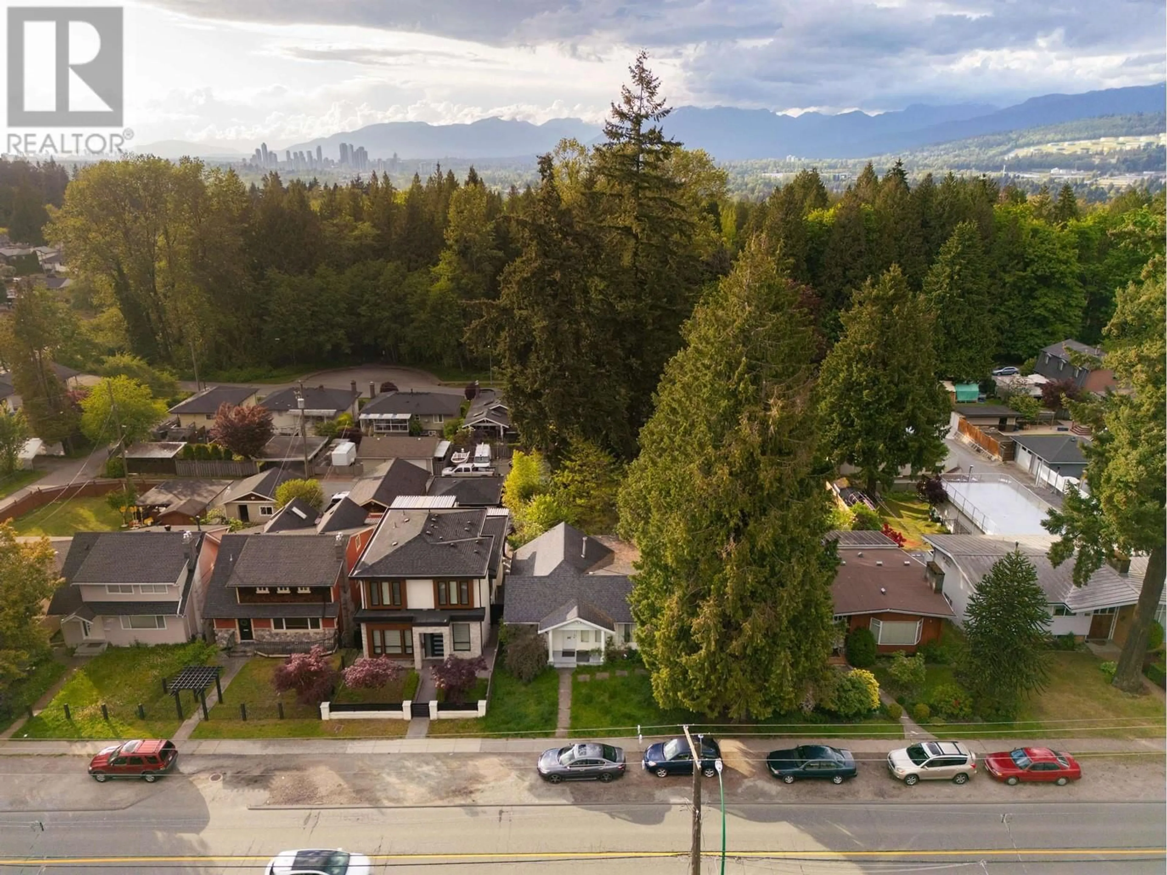 A pic from outside/outdoor area/front of a property/back of a property/a pic from drone, mountain view for 8353 16TH AVENUE, Burnaby British Columbia V3N1S2