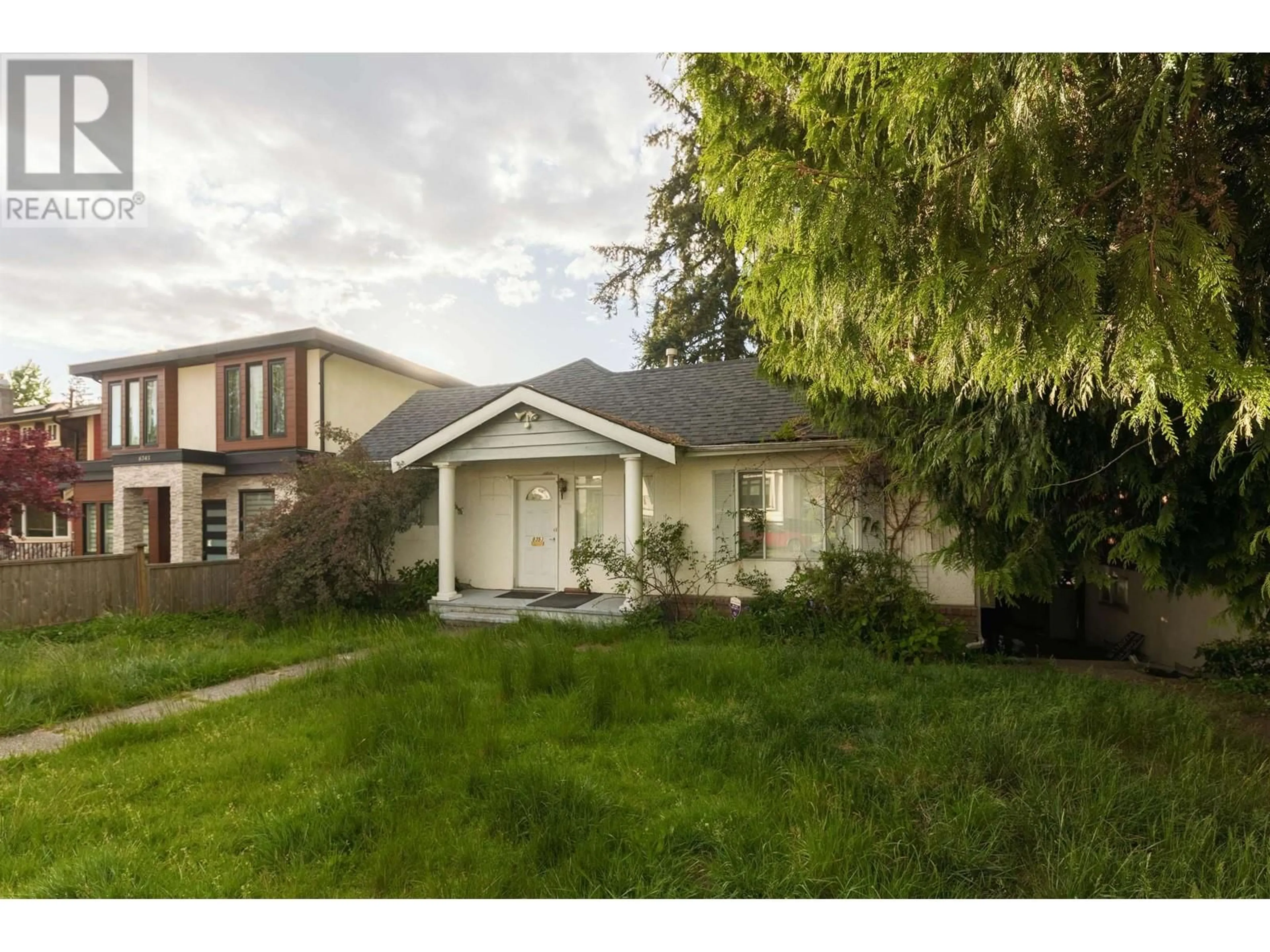 Home with vinyl exterior material, street for 8353 16TH AVENUE, Burnaby British Columbia V3N1S2