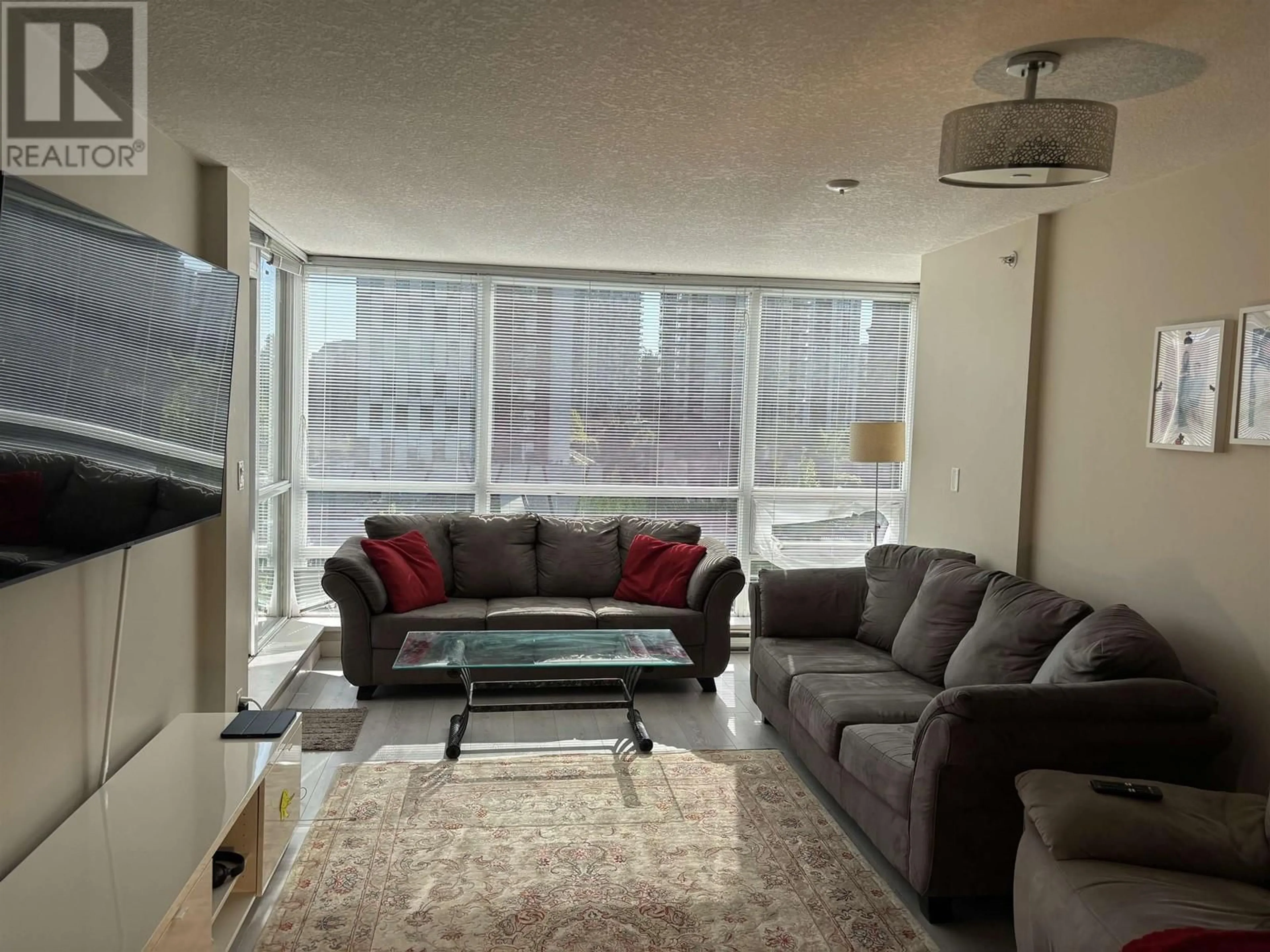 Living room with furniture, unknown for 904 - 2978 GLEN DRIVE, Coquitlam British Columbia V3B0C3
