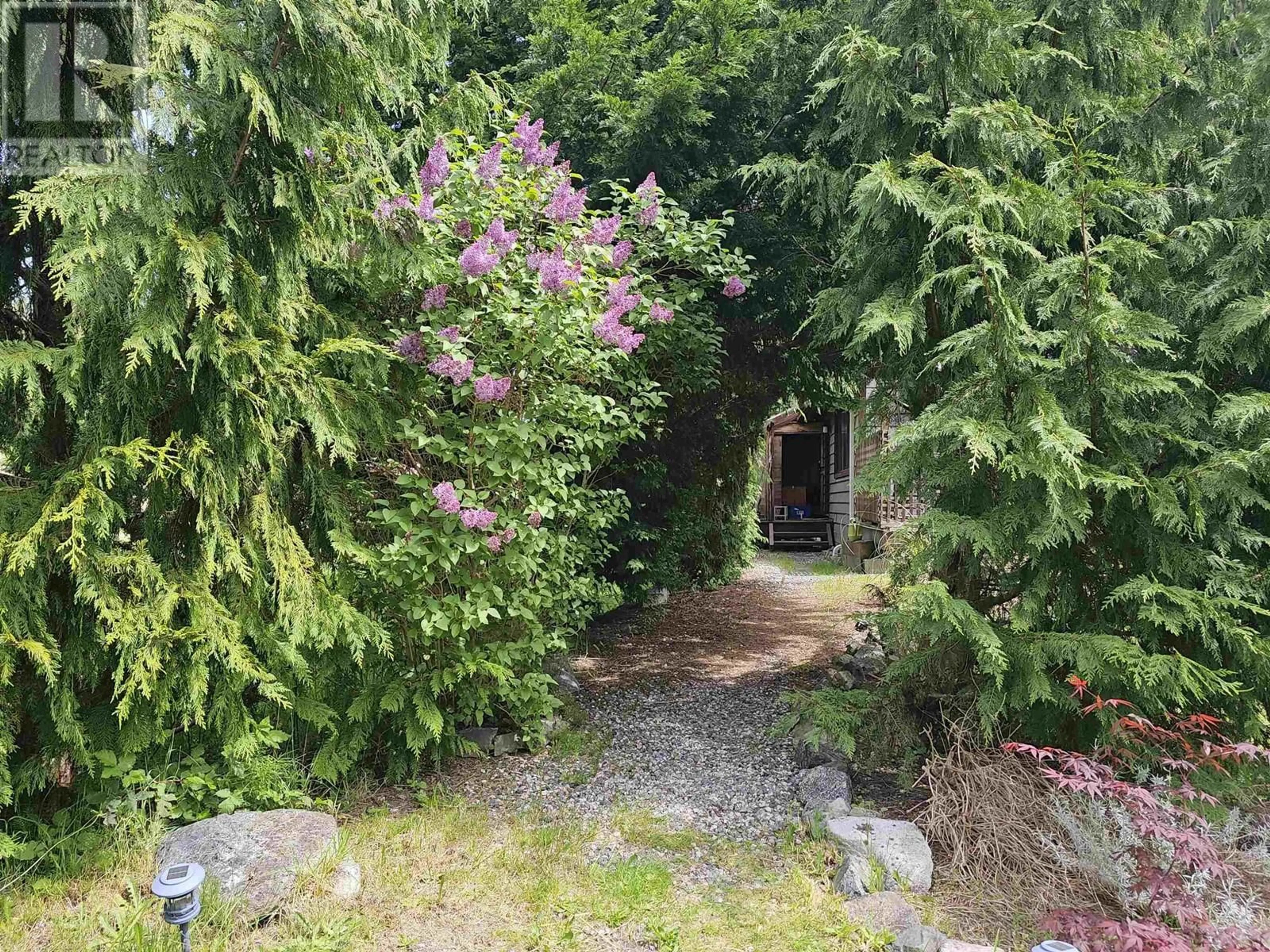 A pic from outside/outdoor area/front of a property/back of a property/a pic from drone, forest/trees view for 12649 MERRILL CRESCENT, Sechelt British Columbia V0N2H1