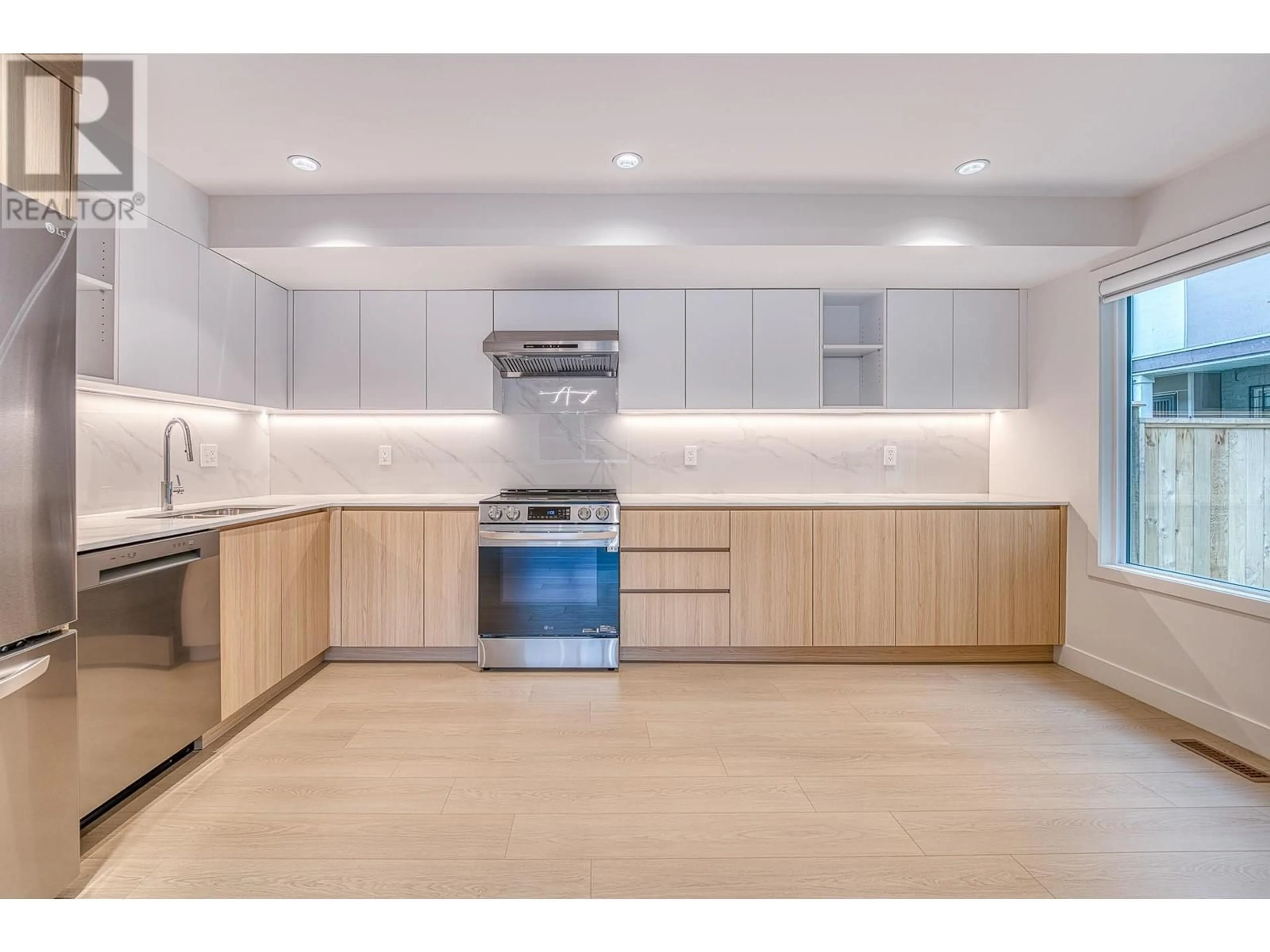 Open concept kitchen, wood/laminate floor for 14 - 8691 COOK ROAD, Richmond British Columbia V6Y1V8