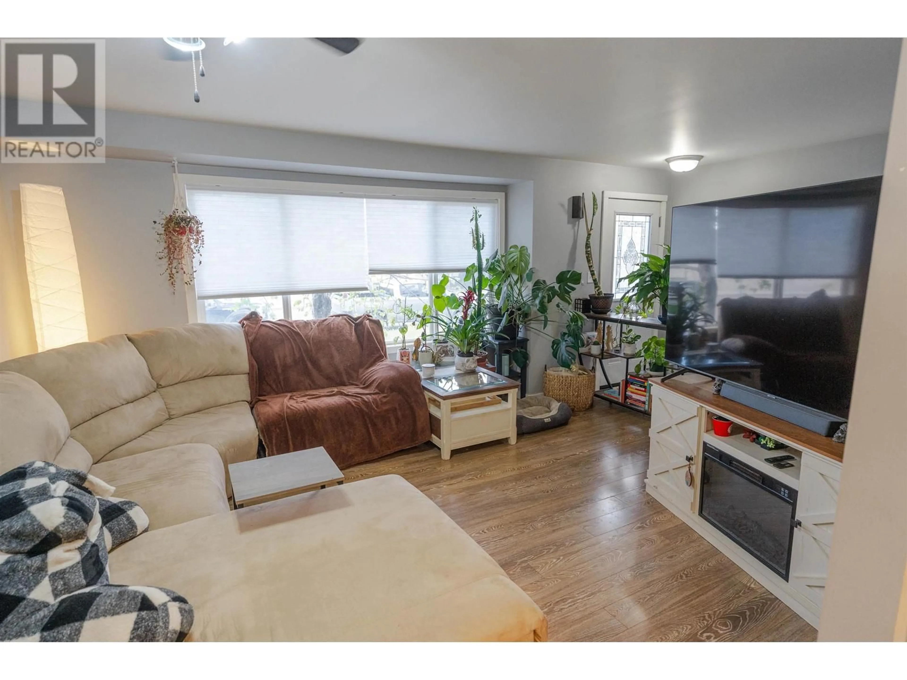 Living room with furniture, unknown for 9812 102 AVENUE, Fort St. John British Columbia V1J2E1