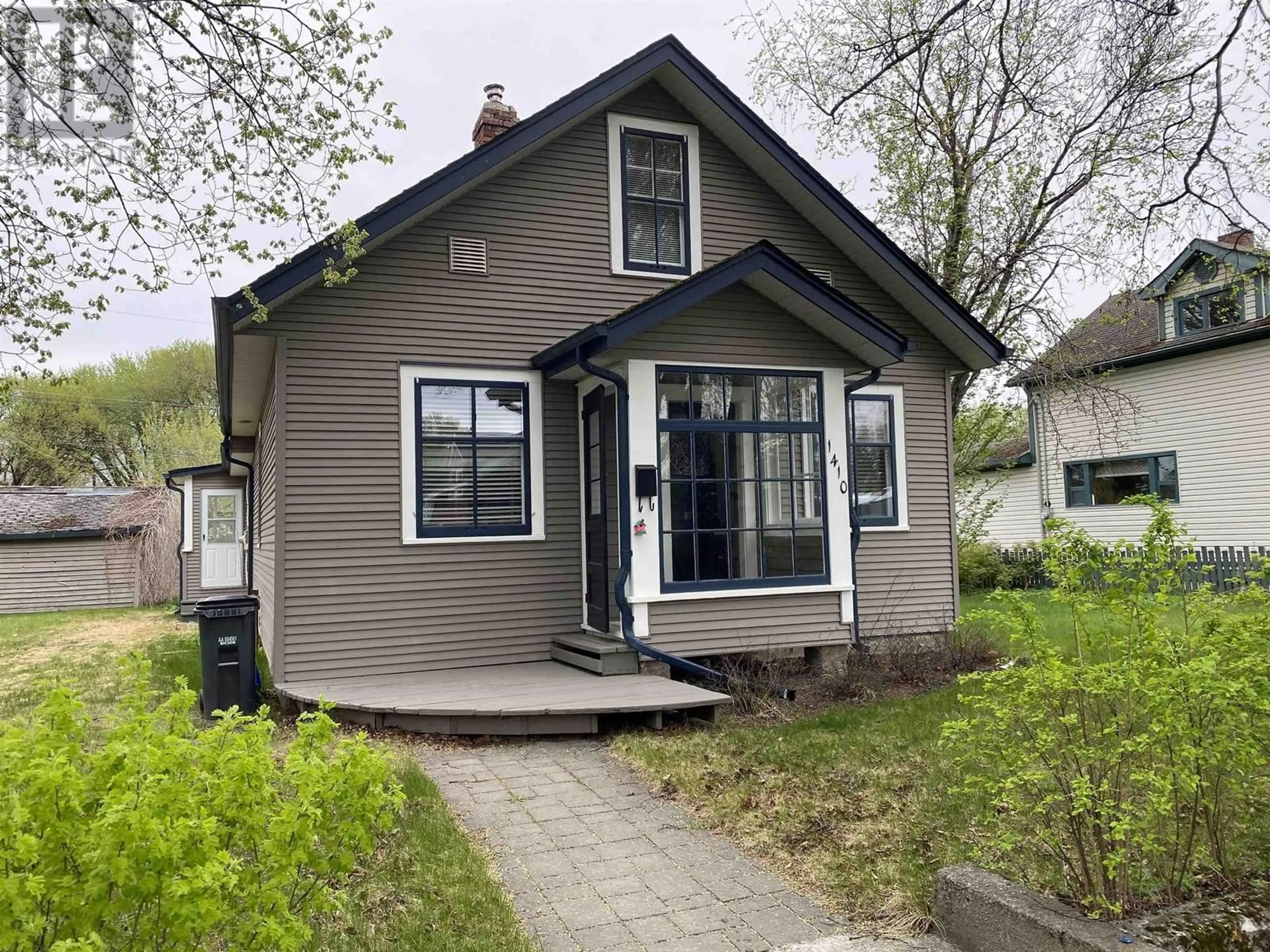 Home with vinyl exterior material, street for 1410 GORSE STREET, Prince George British Columbia V2L1G3
