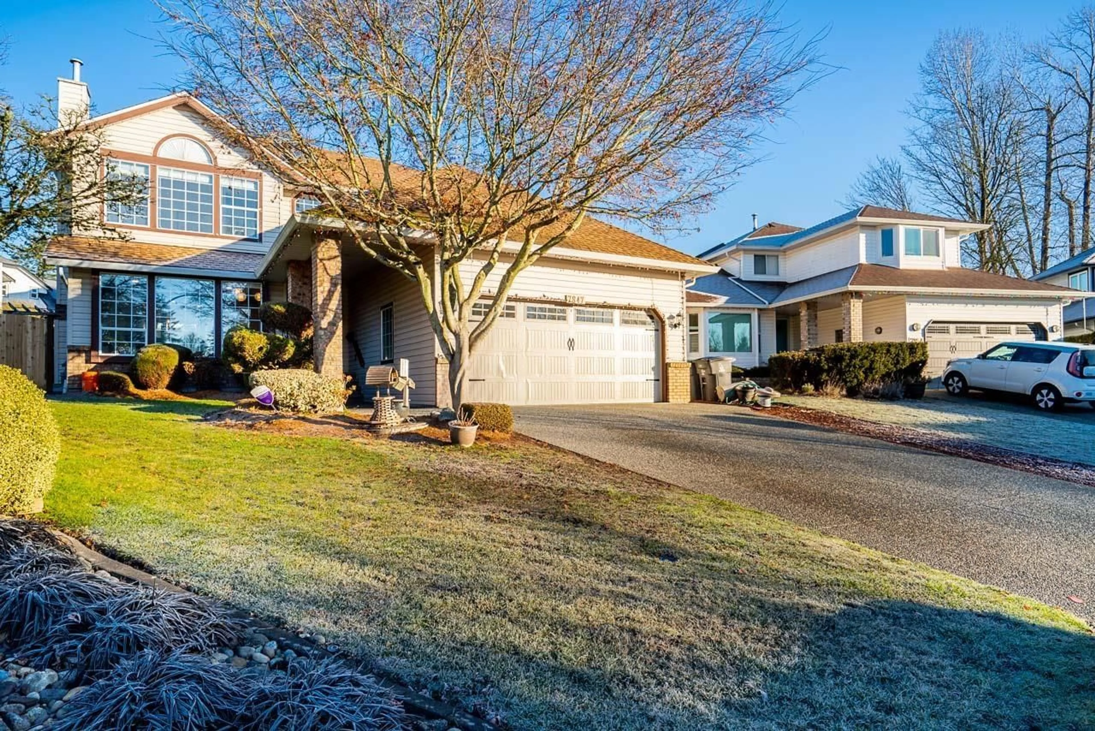 Home with vinyl exterior material, street for 7847 161A, Surrey British Columbia V4N0T8
