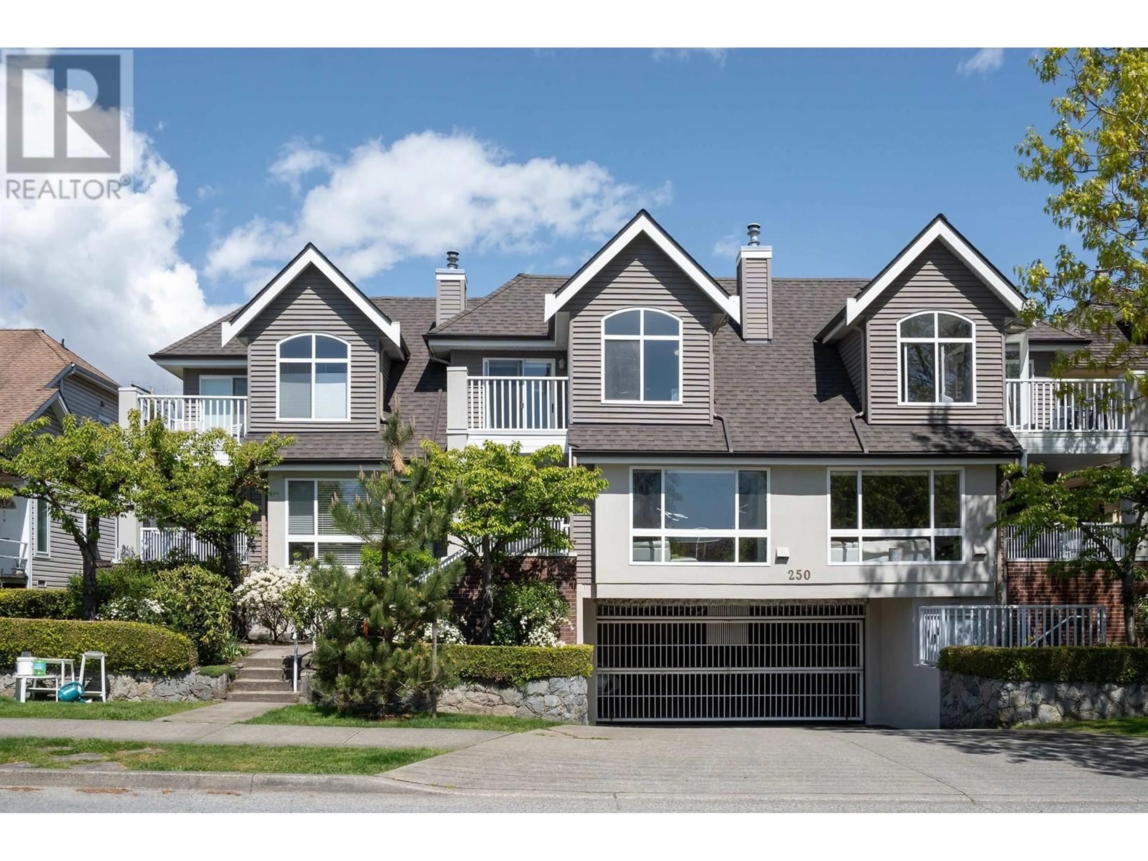 Home with vinyl exterior material, street for 2 - 250 KEITH ROAD, North Vancouver British Columbia V7L1V5