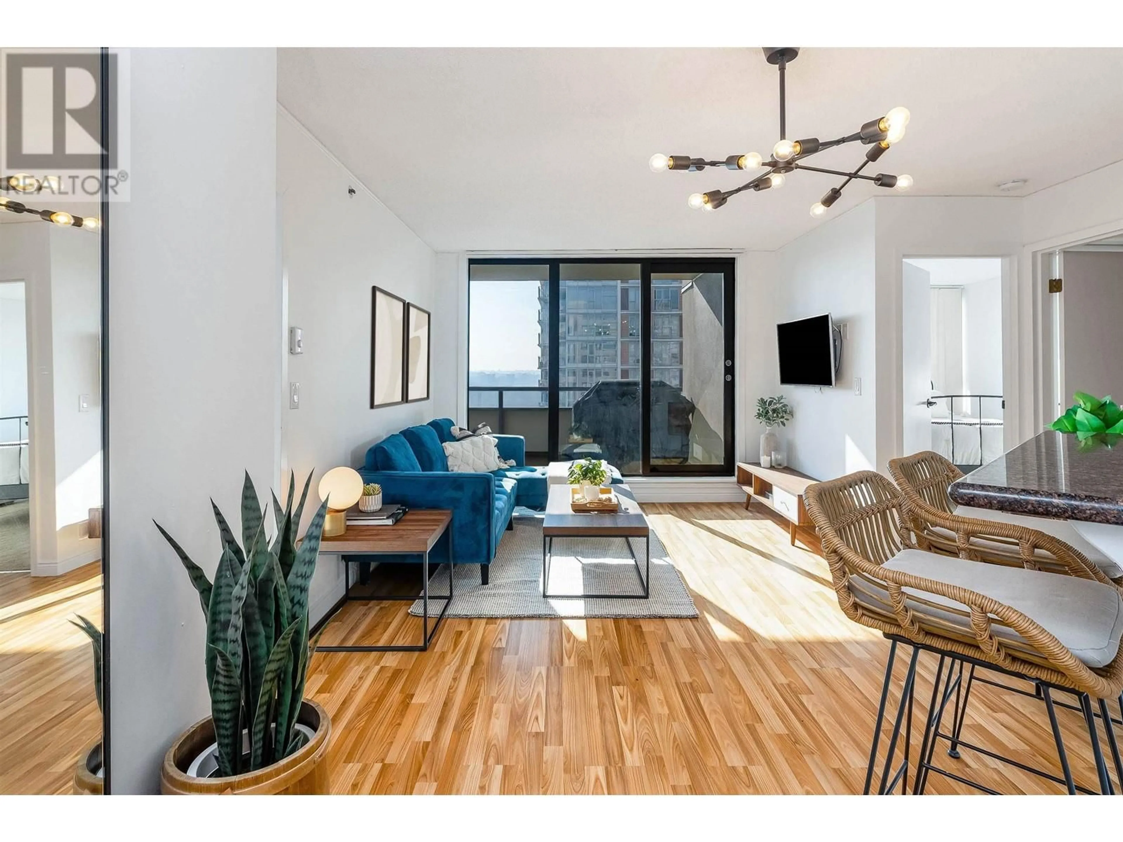 Living room with furniture, wood/laminate floor for 1705 - 789 DRAKE STREET, Vancouver British Columbia V6Z2N7