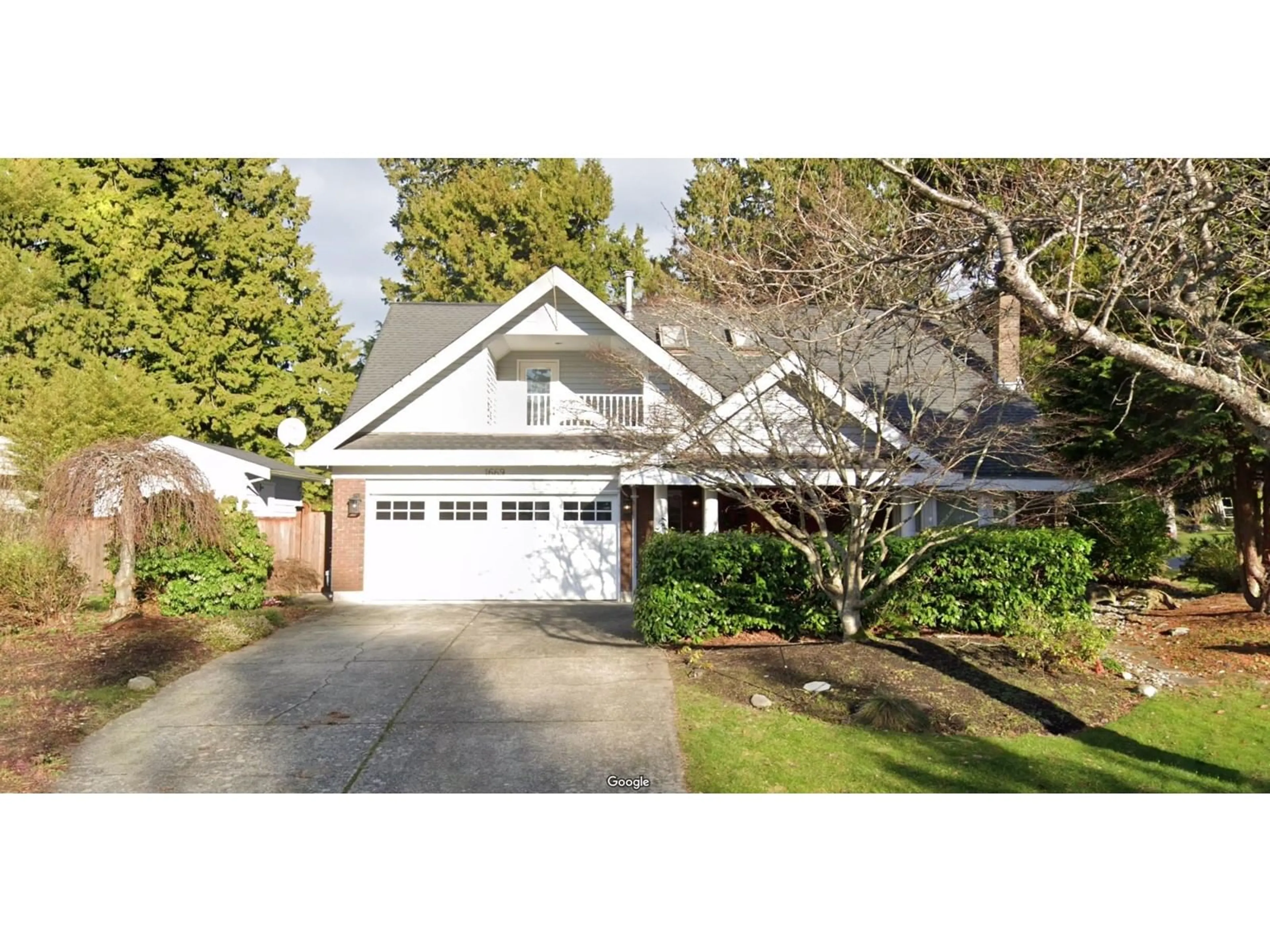 Home with vinyl exterior material, street for 1669 133A, Surrey British Columbia V4A6H5