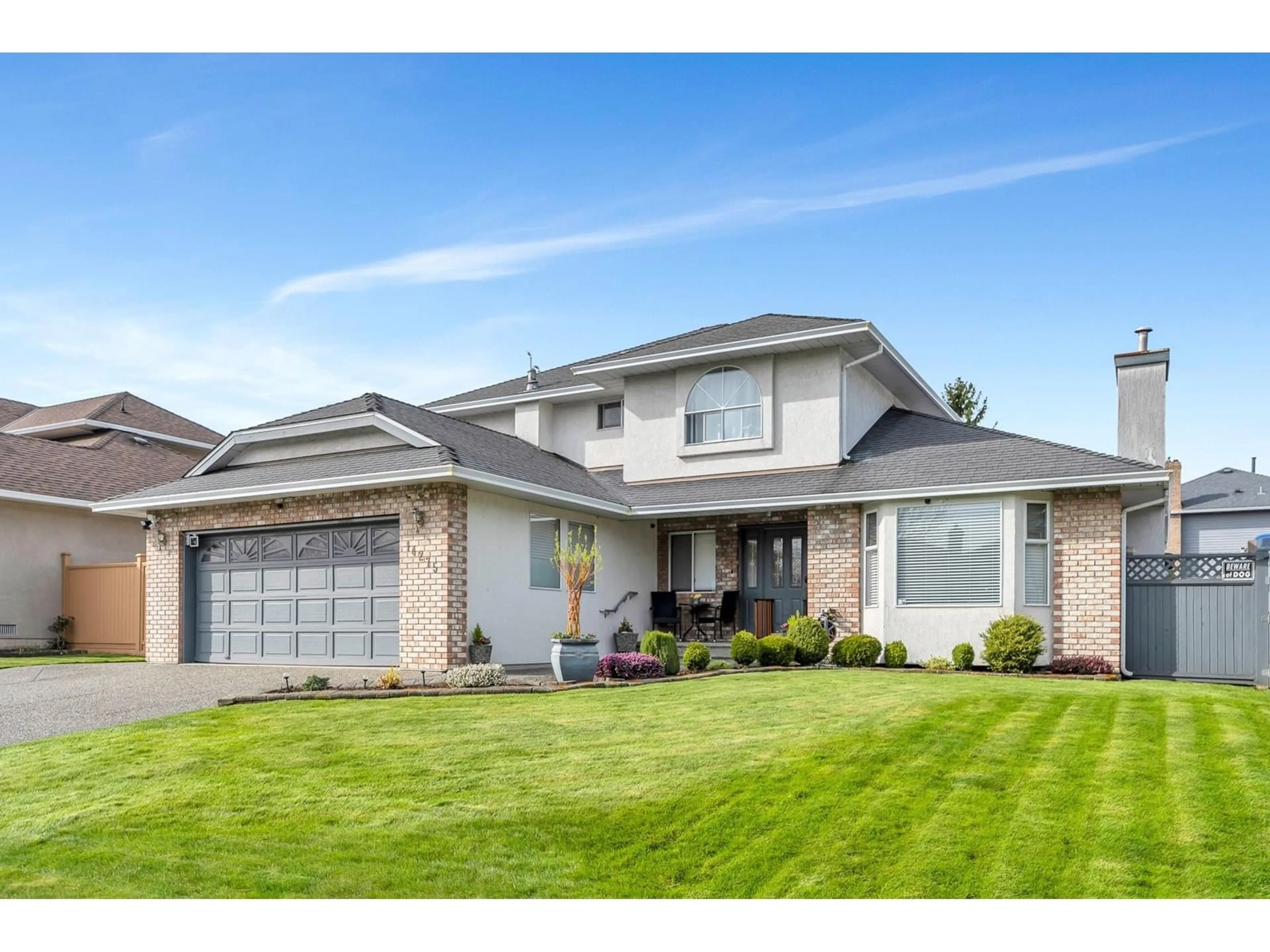 Home with vinyl exterior material, street for 14275 85B, Surrey British Columbia V3W0N9