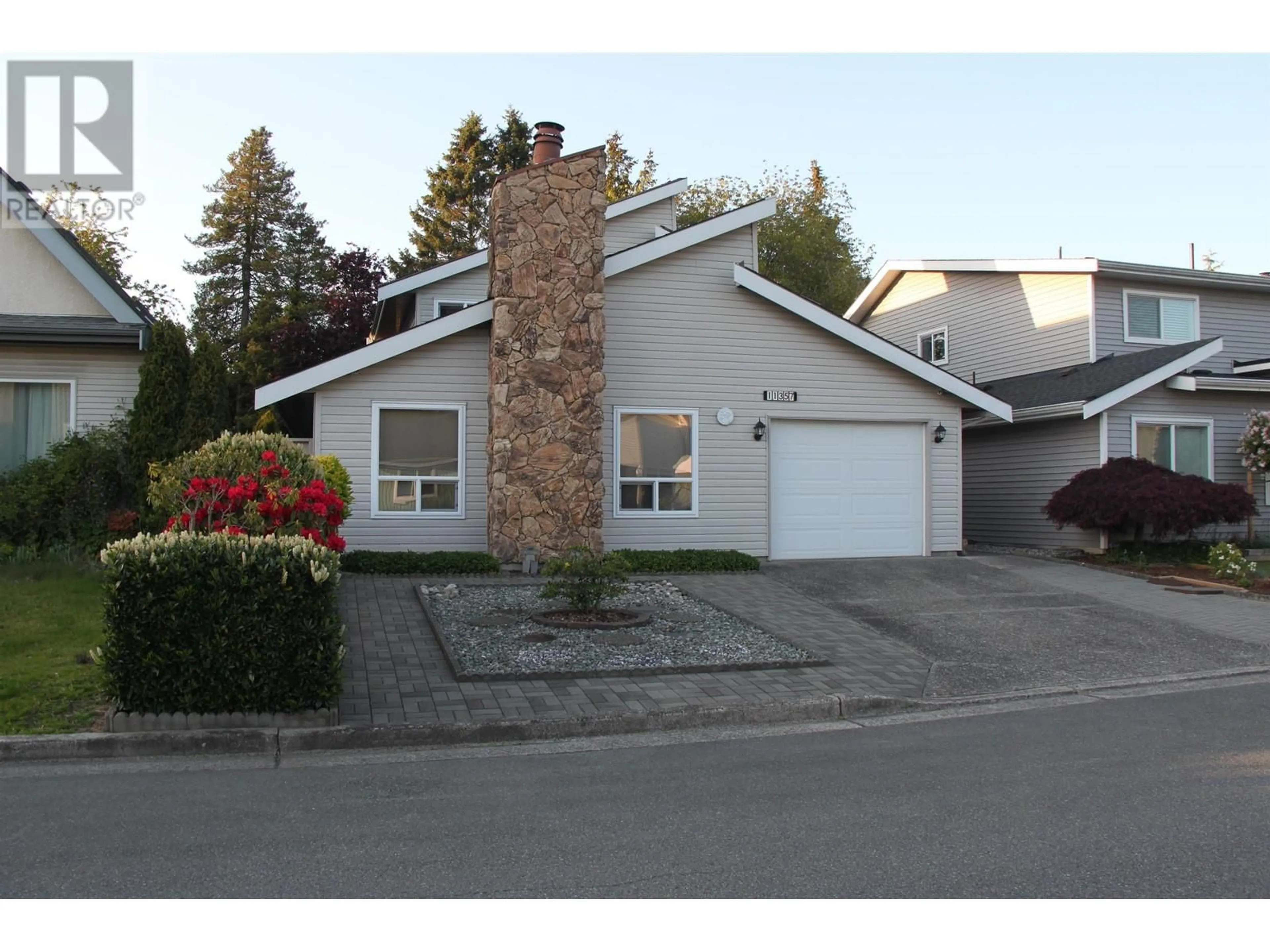 Home with vinyl exterior material, street for 11357 KINGCOME AVENUE, Richmond British Columbia V7A4W1