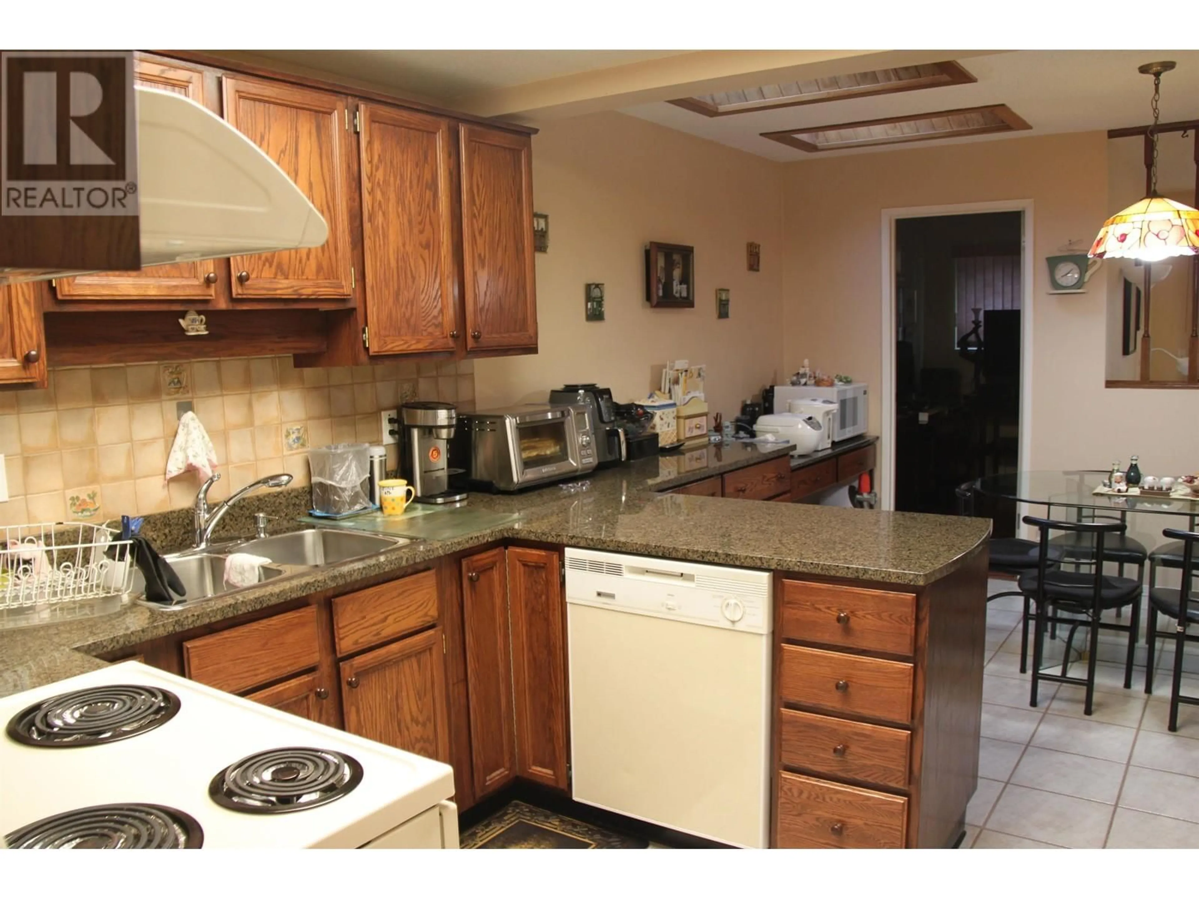 Standard kitchen, unknown for 11357 KINGCOME AVENUE, Richmond British Columbia V7A4W1
